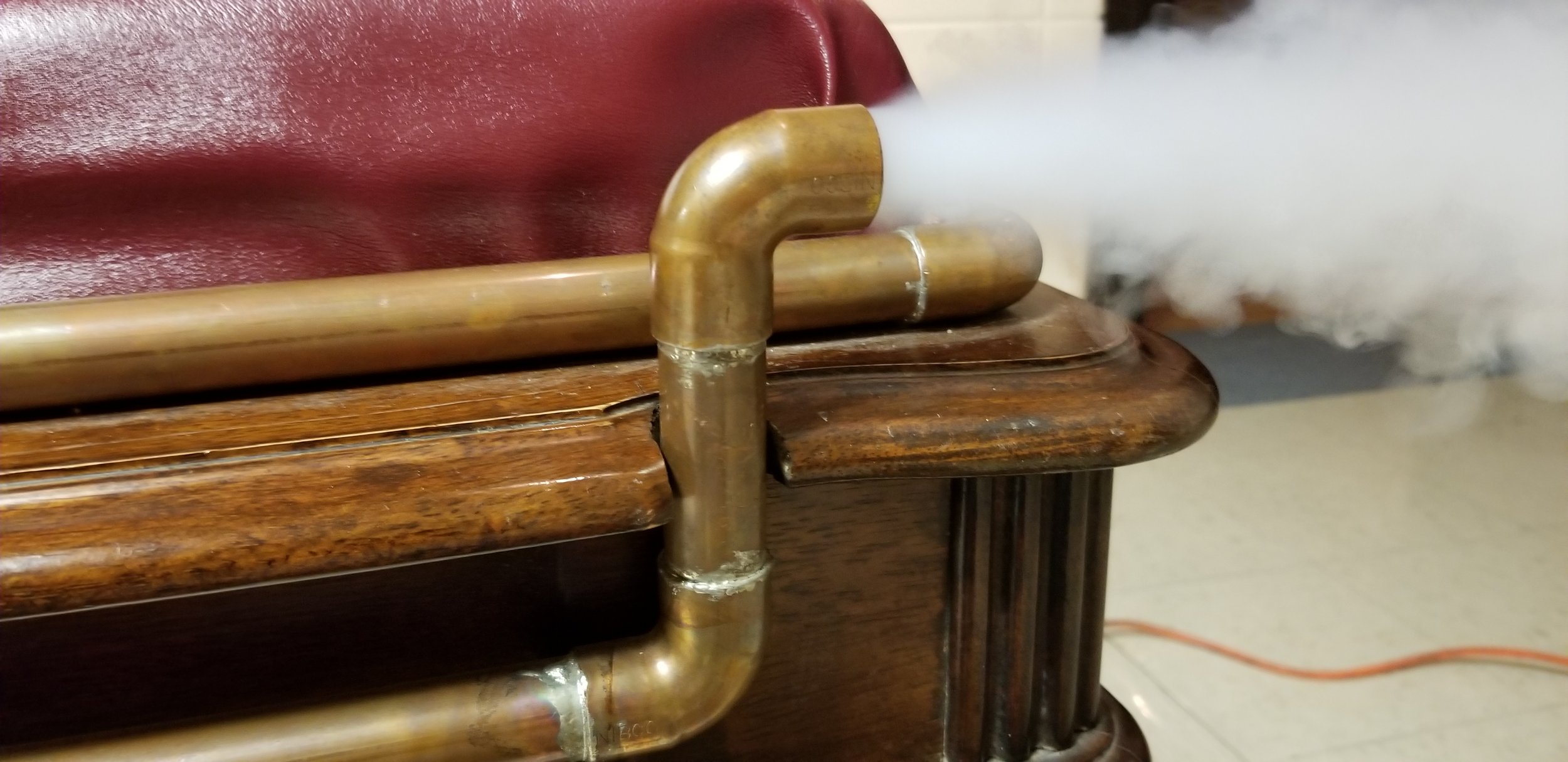 Piano bench complete with steam