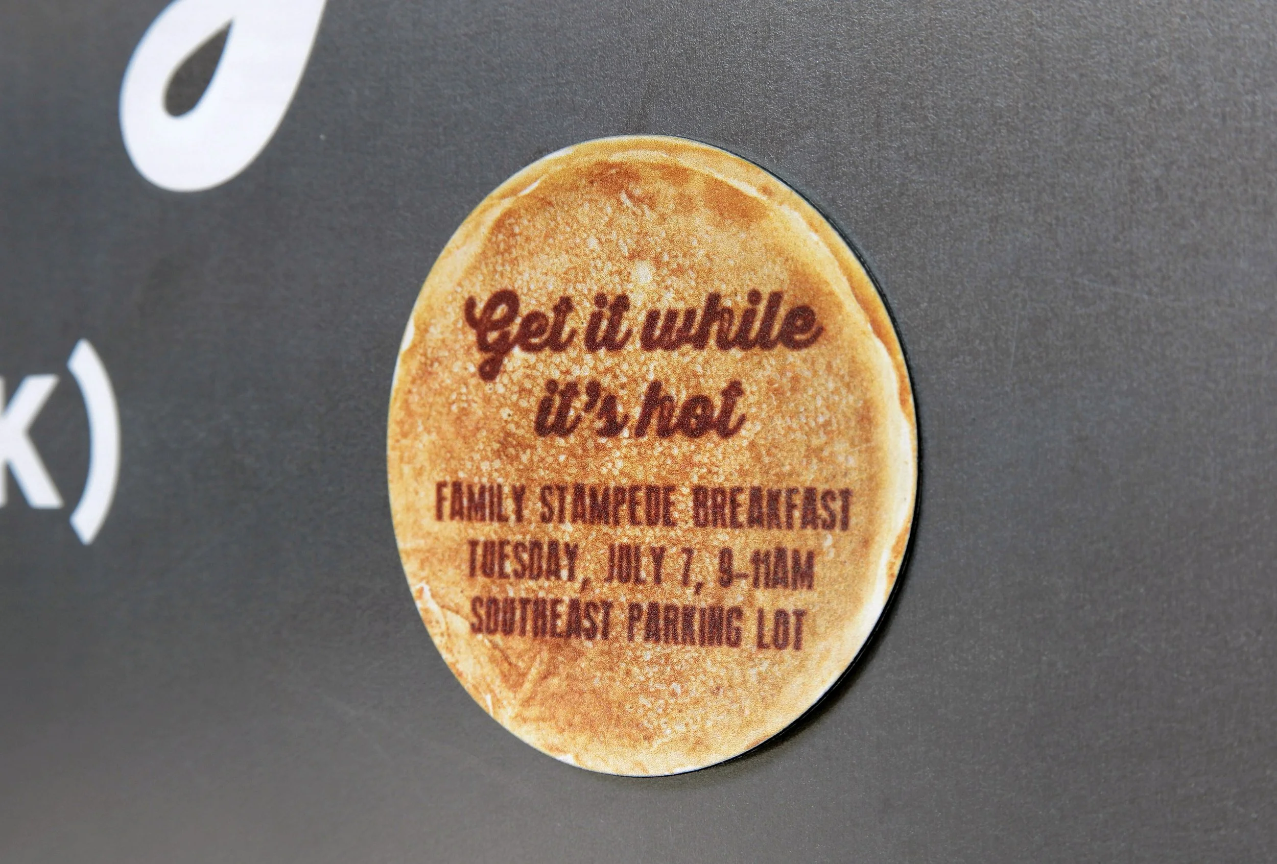 A large sheet of stainless steel was installed as the griddle topped with double sided pancake save the date magnets.