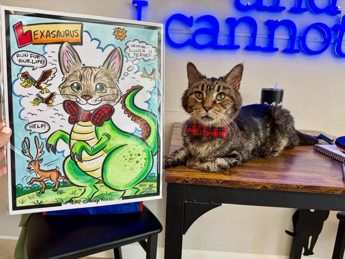 Our volunteer Melanie just returned from Disney where she had a caricature artist create a Lex portrait that embodies his predator side and dinosaur paws!  Oh how he loved the portrait (and the venison and cream cheese that Melanie served him right a