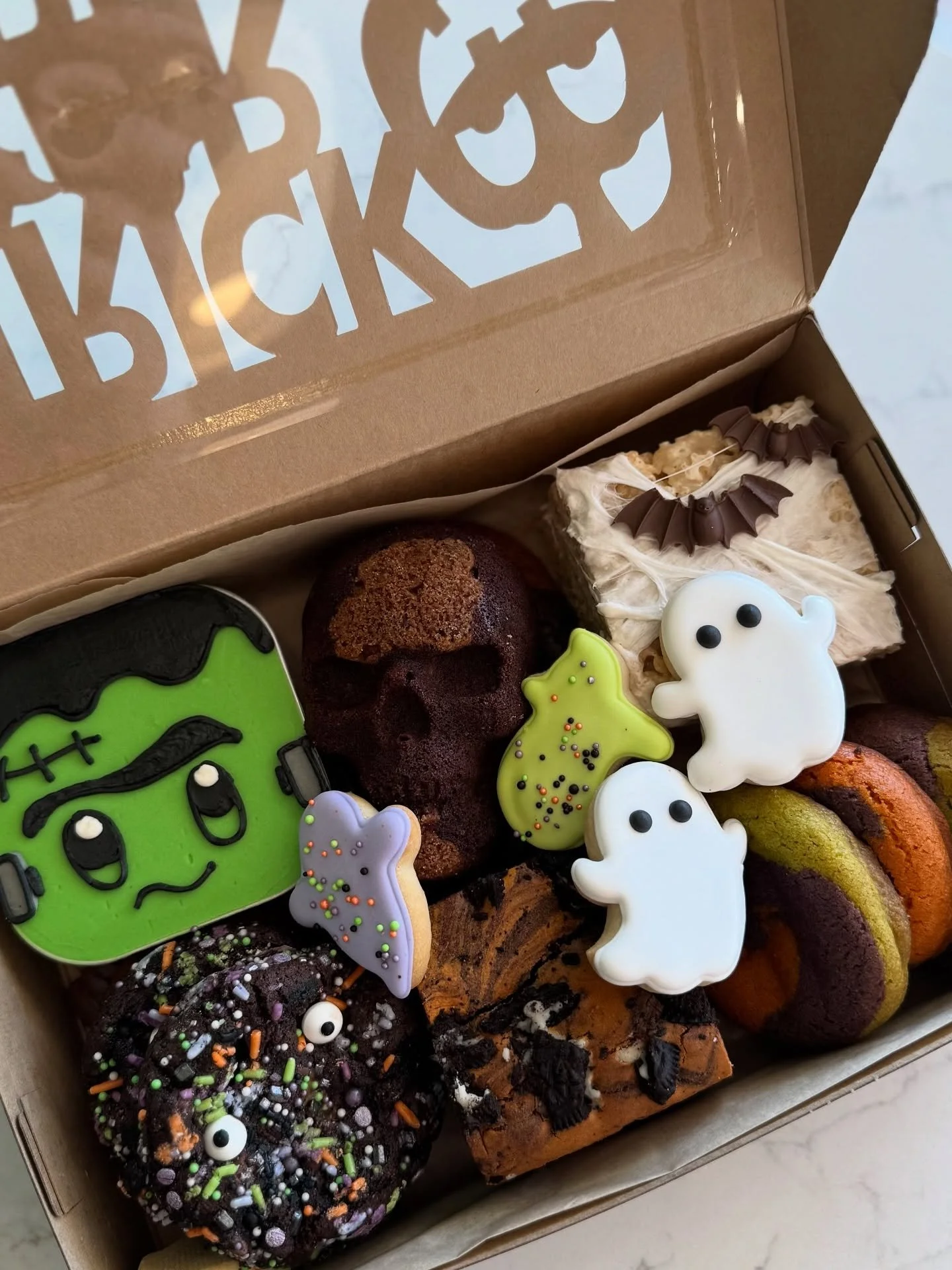 No tricks, just treats! Our spooky Halloween treat box is available for pre-order on our website!

Boo Box includes: 
(1) Rice Krispie Treat
(1) Brookie Skull
(1) Cookies n&rsquo; Scream Brownie
(1) Frankenstein Funfetti Cupcake
(2) Chocolate Chip Co
