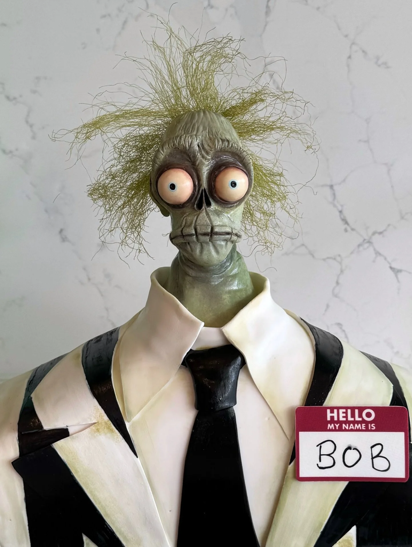 One final Bob appreciation post before spooky season comes to an end. He&rsquo;ll go down in history as one of my favorite cakes of all time! 💚🖤
Happy Halloween, everyone!

#houstonbakery #halloweencake #beetlejuicebeetlejuice #beetlejuicecake #mod