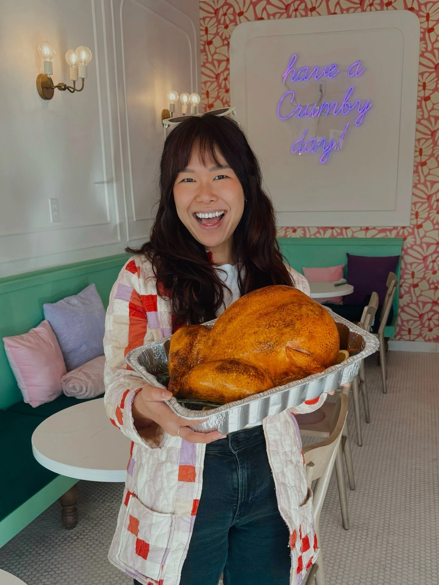 My dream of making a roasted turkey cake has been realized, and our giveaway winner, Amy got to take it home today! This plump turkey is carved from Confetti cake with vanilla Swiss meringue buttercream and covered in fondant. Handing it off was defi