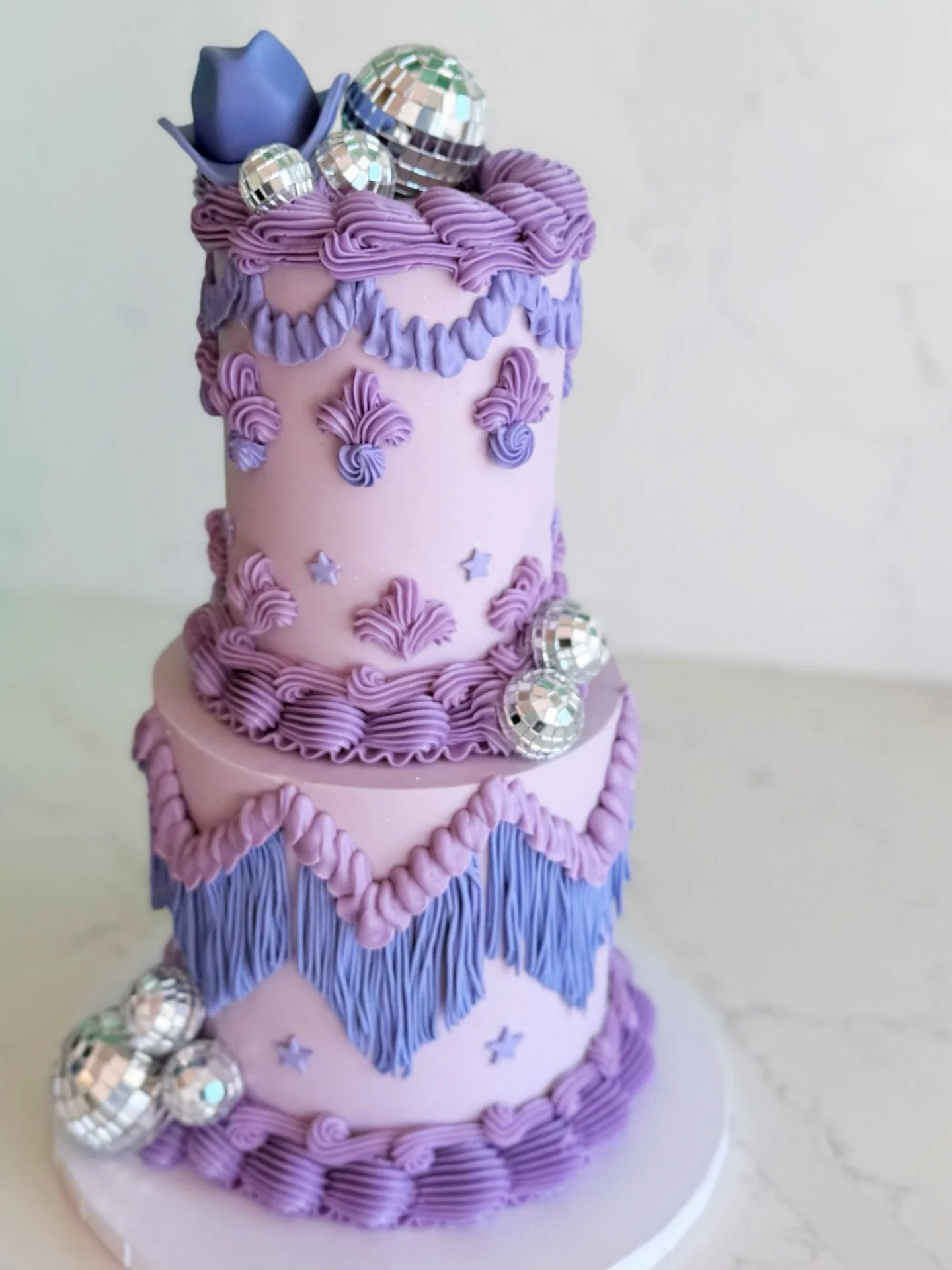 A couple of cuties from this weekend. 💜

1. Lavender Western 
2. Buttercream-only Gengar
3. Ube Crinkle Cookies

#houstonbakery #houstoncakes #houstoncookies #gengarcake #houstoncustomcakes