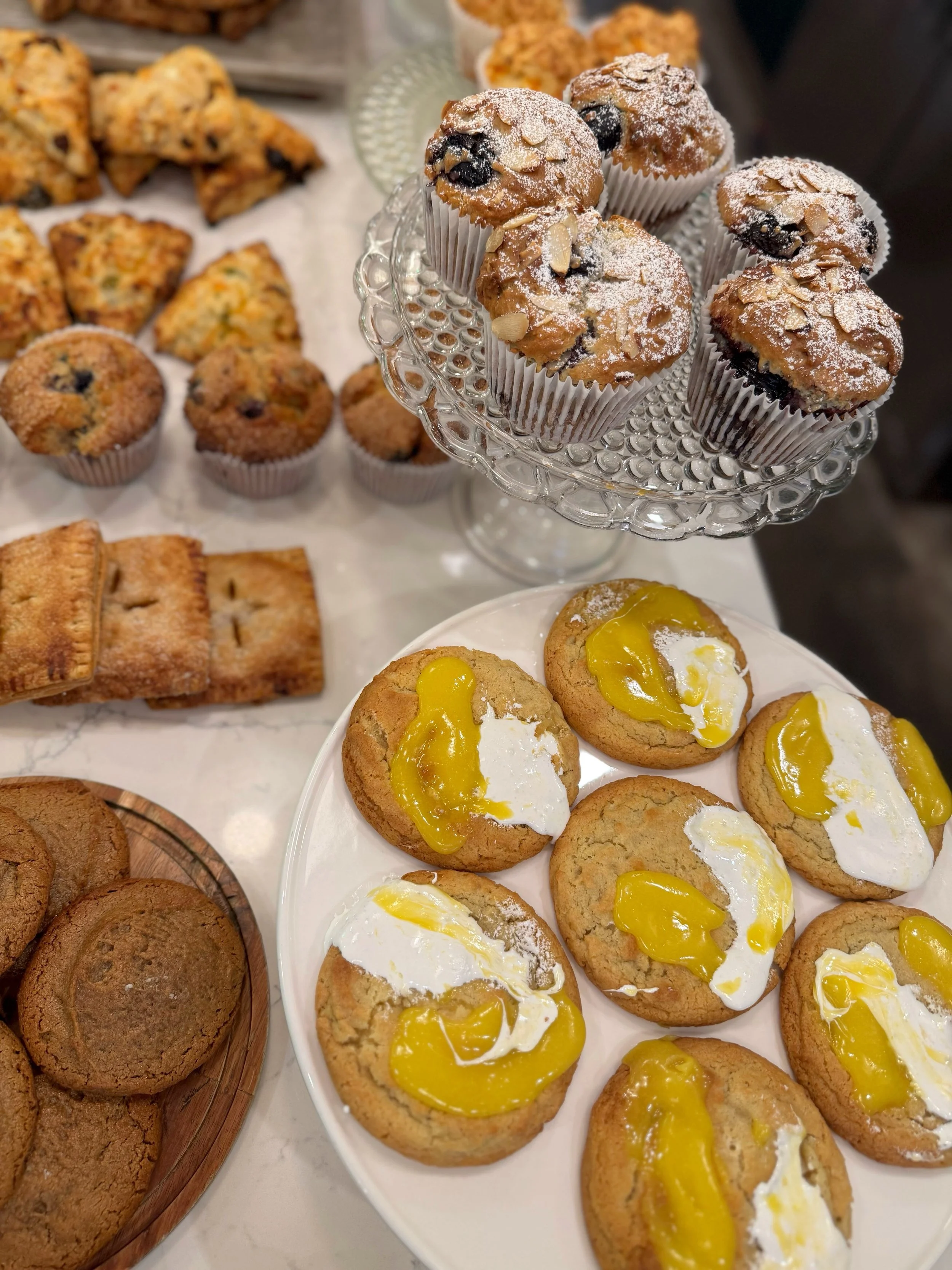 New month, new menu!

Cookies
Strawberry Chocolate Chip
Lemon Meringue

Scones
Sundried Tomato &amp; Feta
GF Apple Cinnamon

Rolls &amp; Danishes
Blueberry Cobbler Roll
Peaches &amp; Cream Danish

Muffins
Cherry Almond
Savory Ham &amp; Cheddar (GF)


