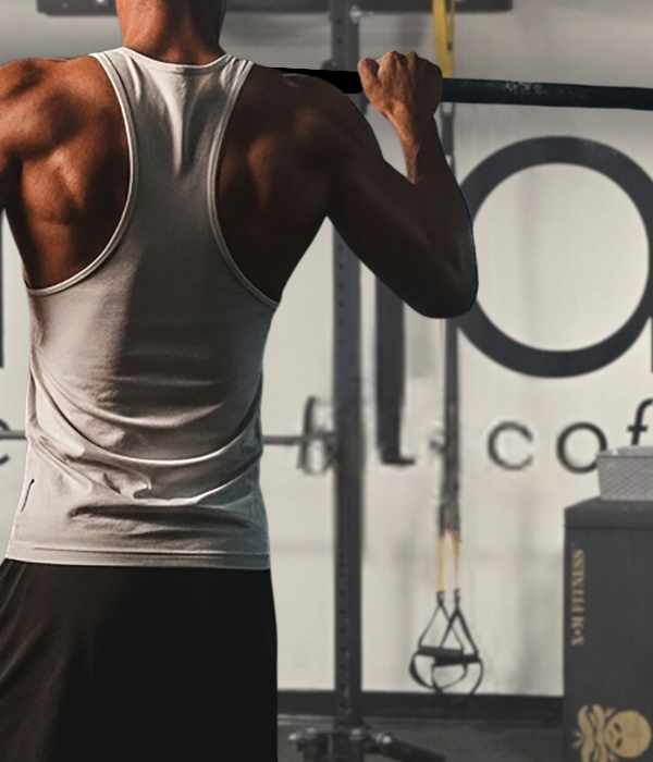 the powerhaus powerUP training program focuses on upper body strength such as pull-ups shown here at the studio.