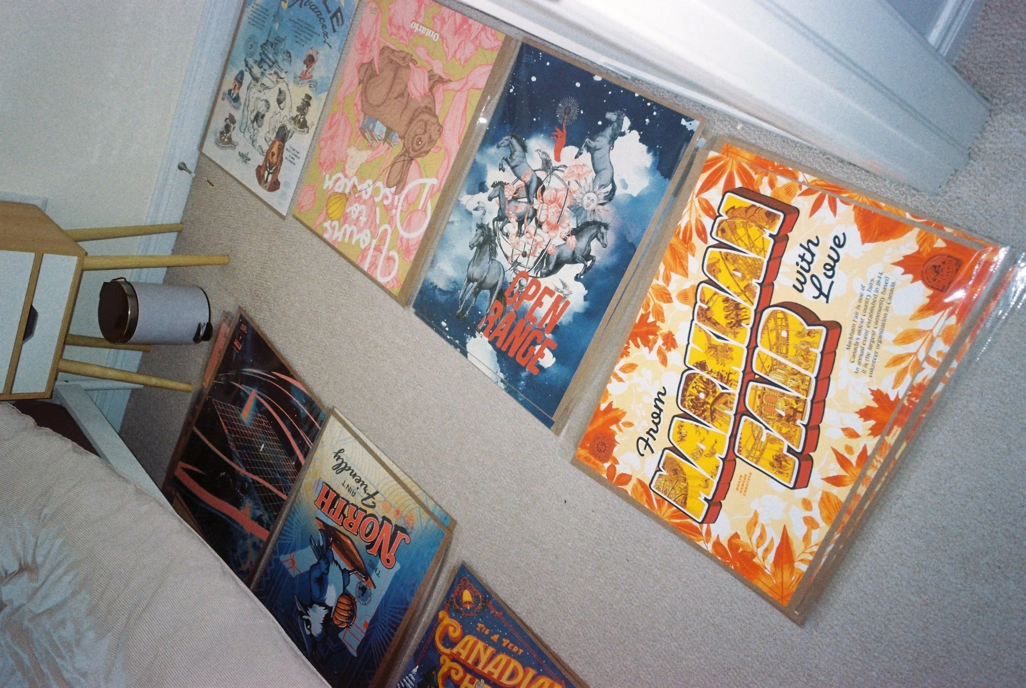 Ontario themed poster prints from Tony Yang - Brain Damage Creative, including "Ontario, Yours to discover" "Markham Fair" "Open range wild horses" "Oakville" "Toronto Blue Jays" "Canadian christmas"