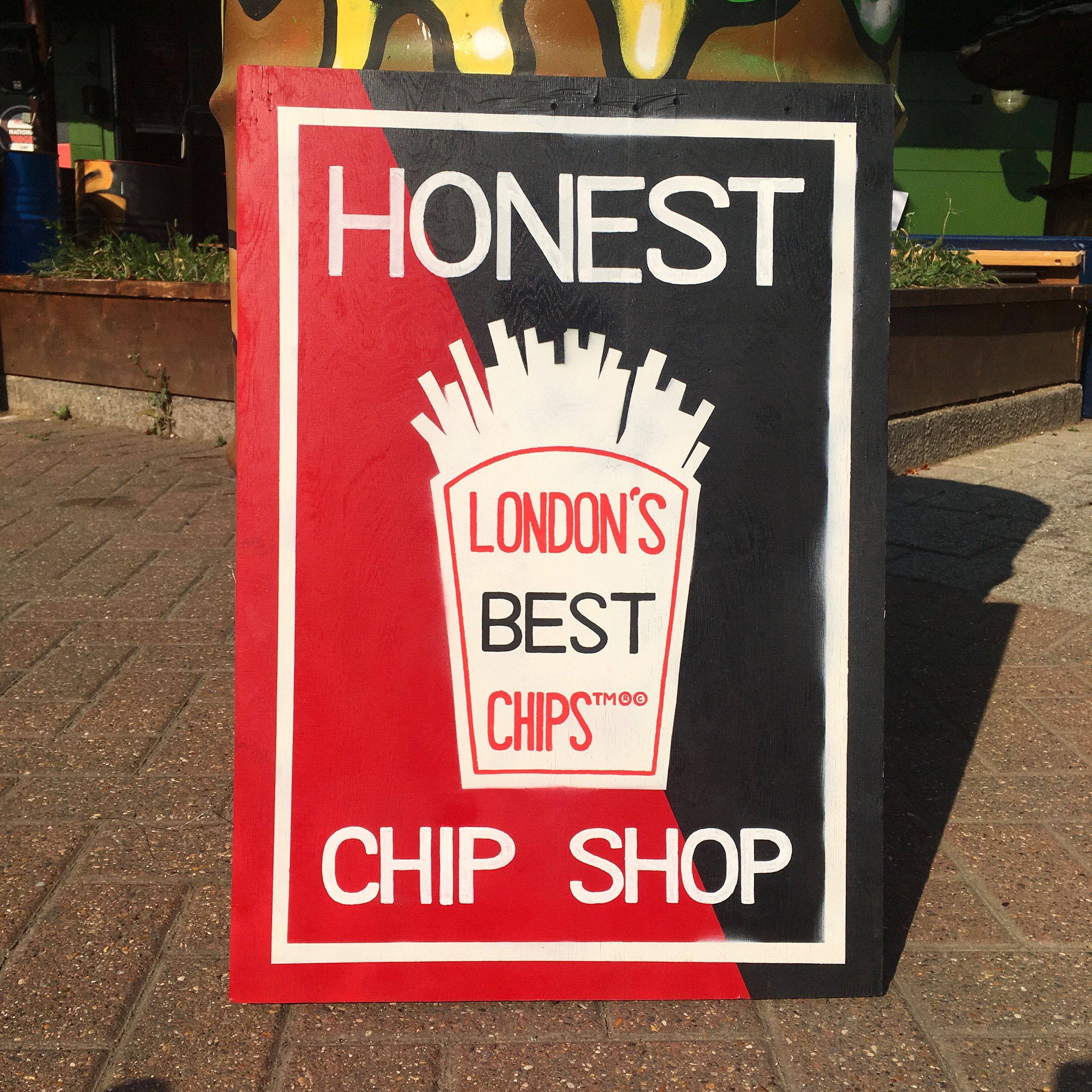 Honest Chip Shop sign for National Burger Day at Hawker House.