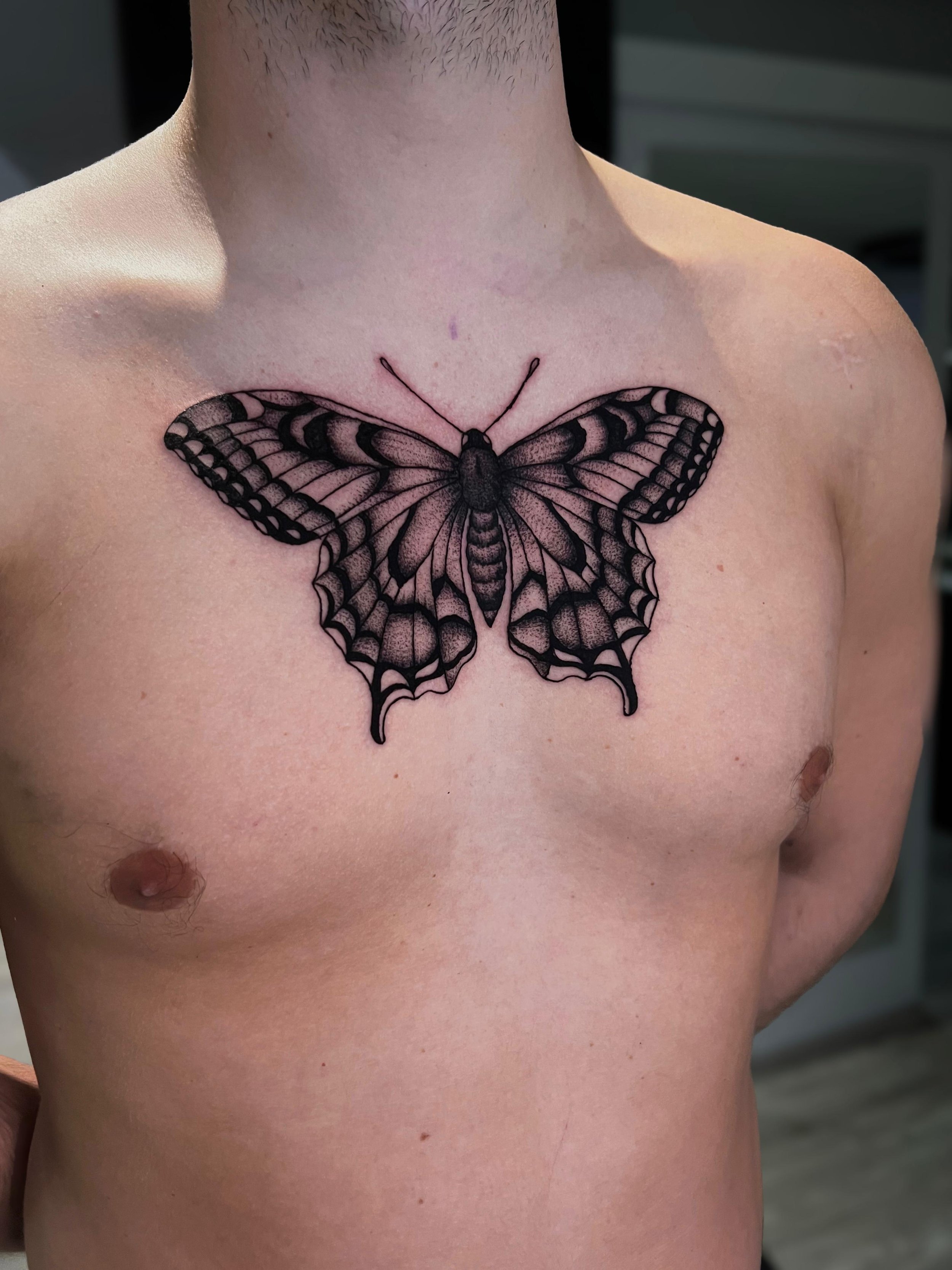Liv Hornblower butterfly chest tattoo