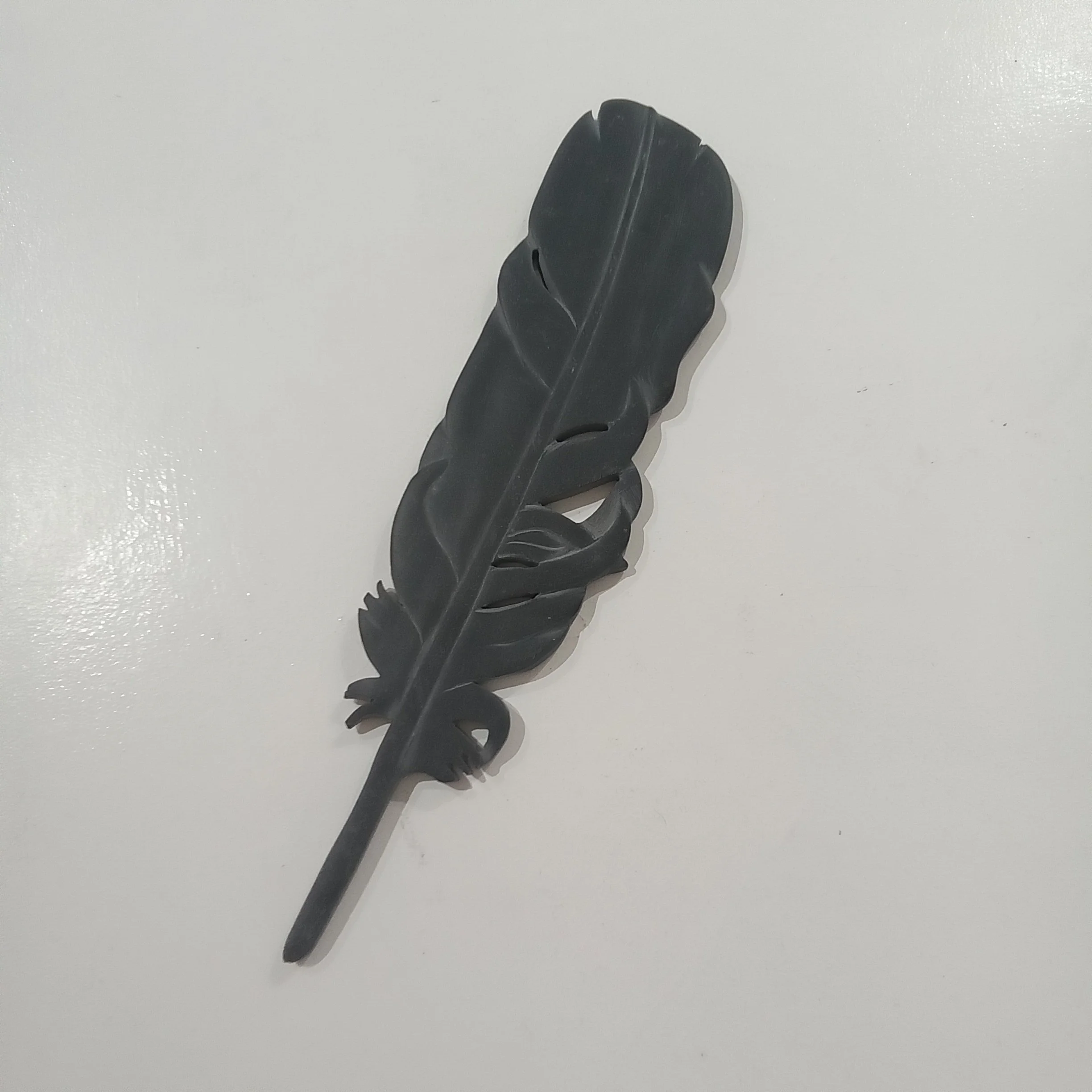 Hand Carved Slate Feathers by Meic Watts