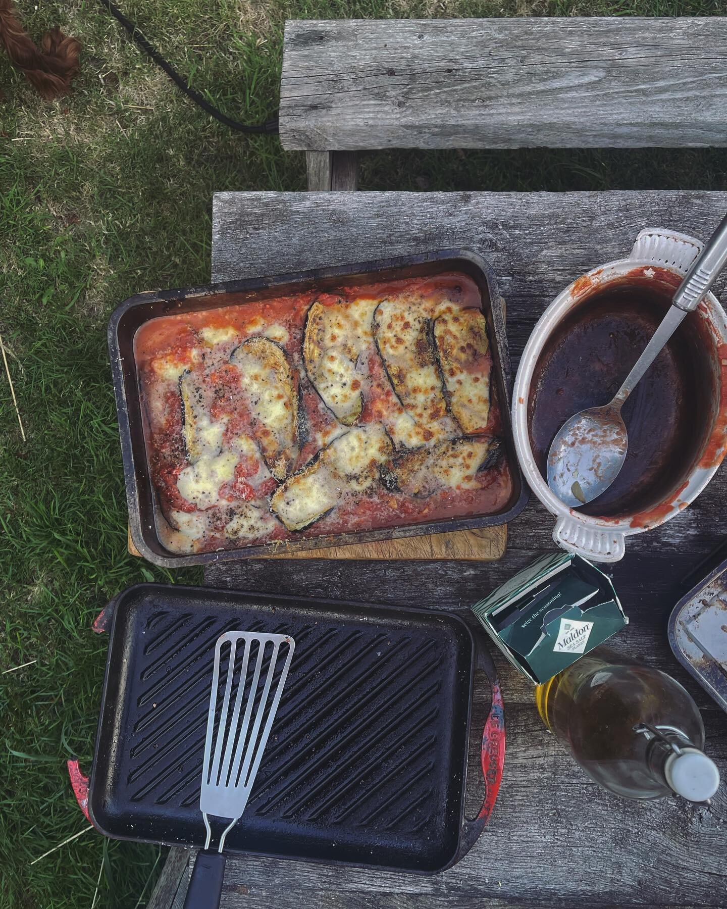Paddock evening. Fire lit and aubergines roasted then baked in tomato with mozzarella&hellip; 🍷
