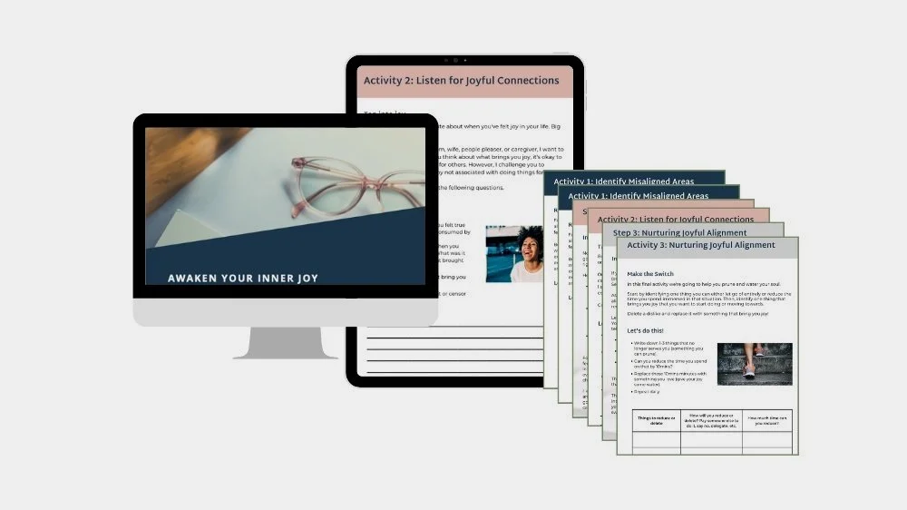 Computer screen displaying a presentation titled 'Awaken Your Inner Joy' with glasses on a desk, and several pages of a workbook or guide next to it, including activities related to joyful connections and mindful practices.