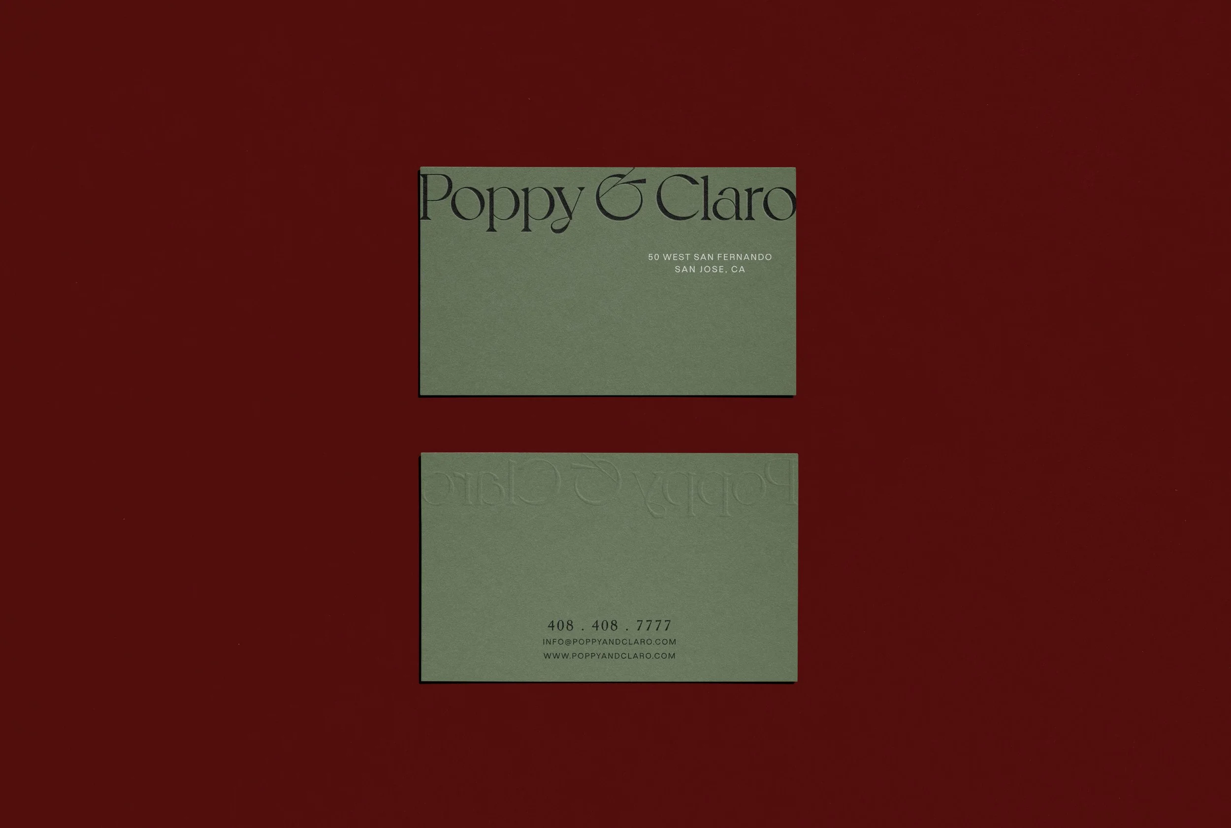 Sage green restaurant business cards for the San Jose location featuring minimalist serif typography, displayed in a restaurant website design portfolio to showcase meticulous brand collateral.