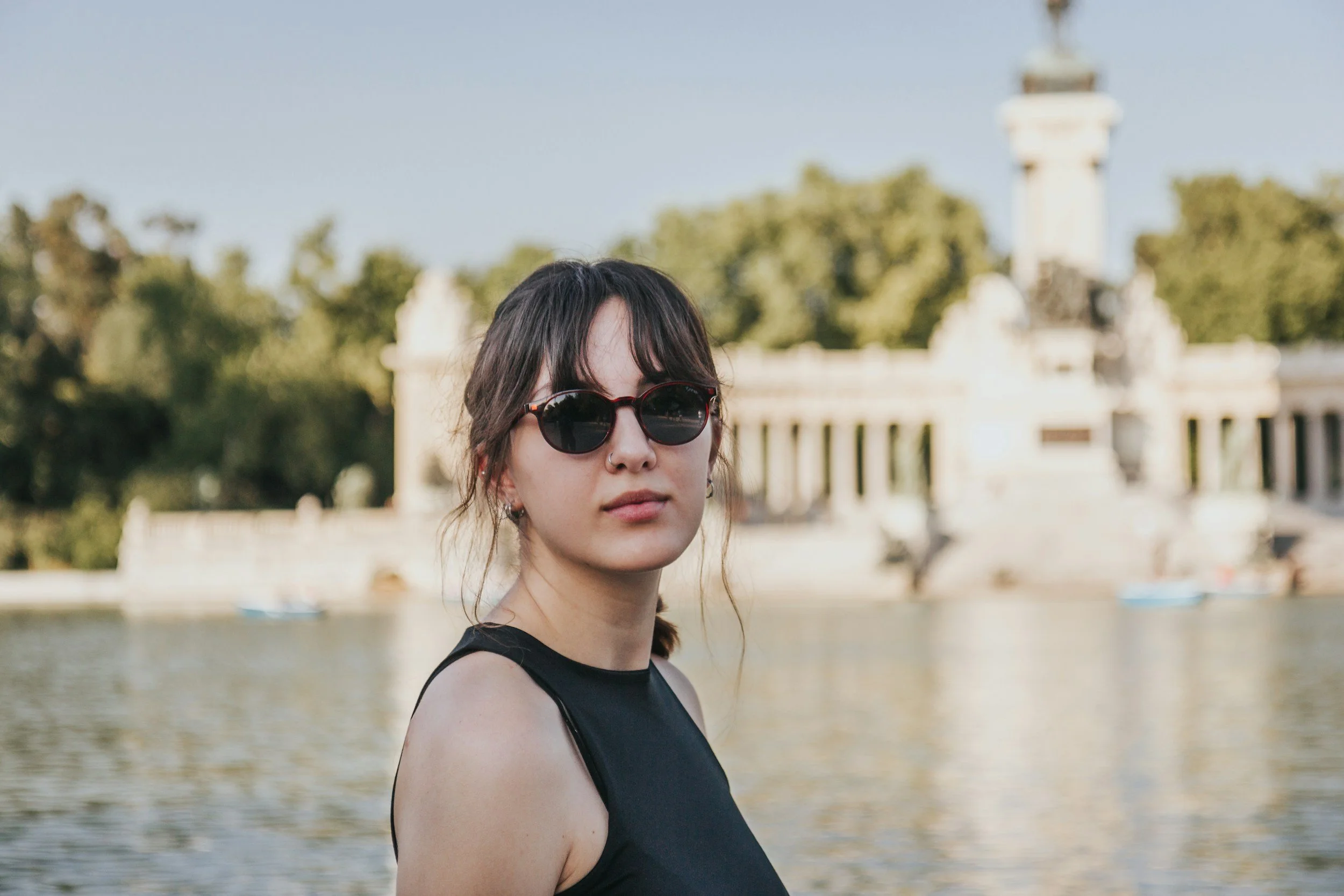 a youA young woman with sunglasses in front of a lake. Carter Psychotherapy Collective offers ERP for phobias and OCD in South Pasadena, California
