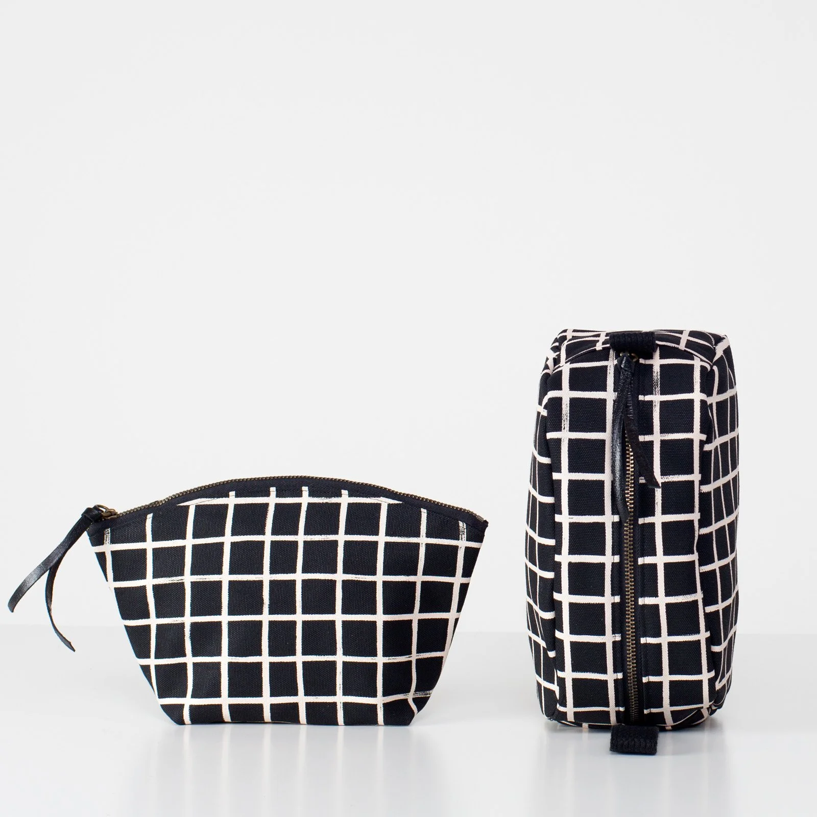brush grid dopp kit and cosmetic group shot.jpg