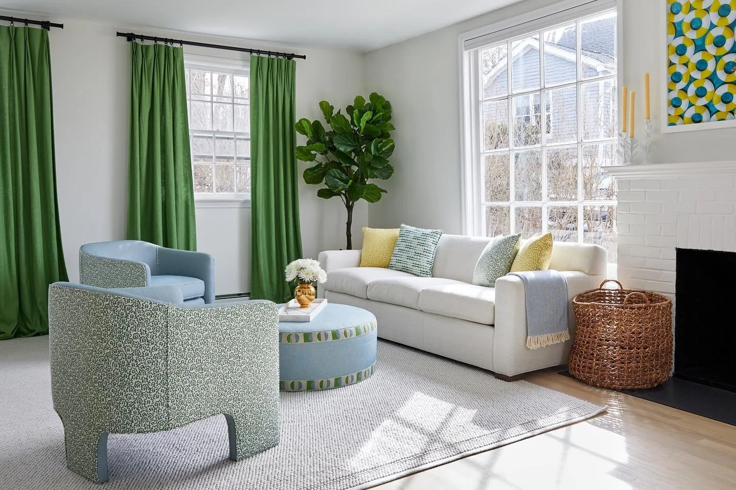 This room was all about the mix of fabrics. The chairs have a @studiocathynordstrom fabric on the back, with a @soanebritain fabric on the front. The ottoman was done in the same Soane fabric with a tape by @christopherfarrcloth. The sofa was repurpo