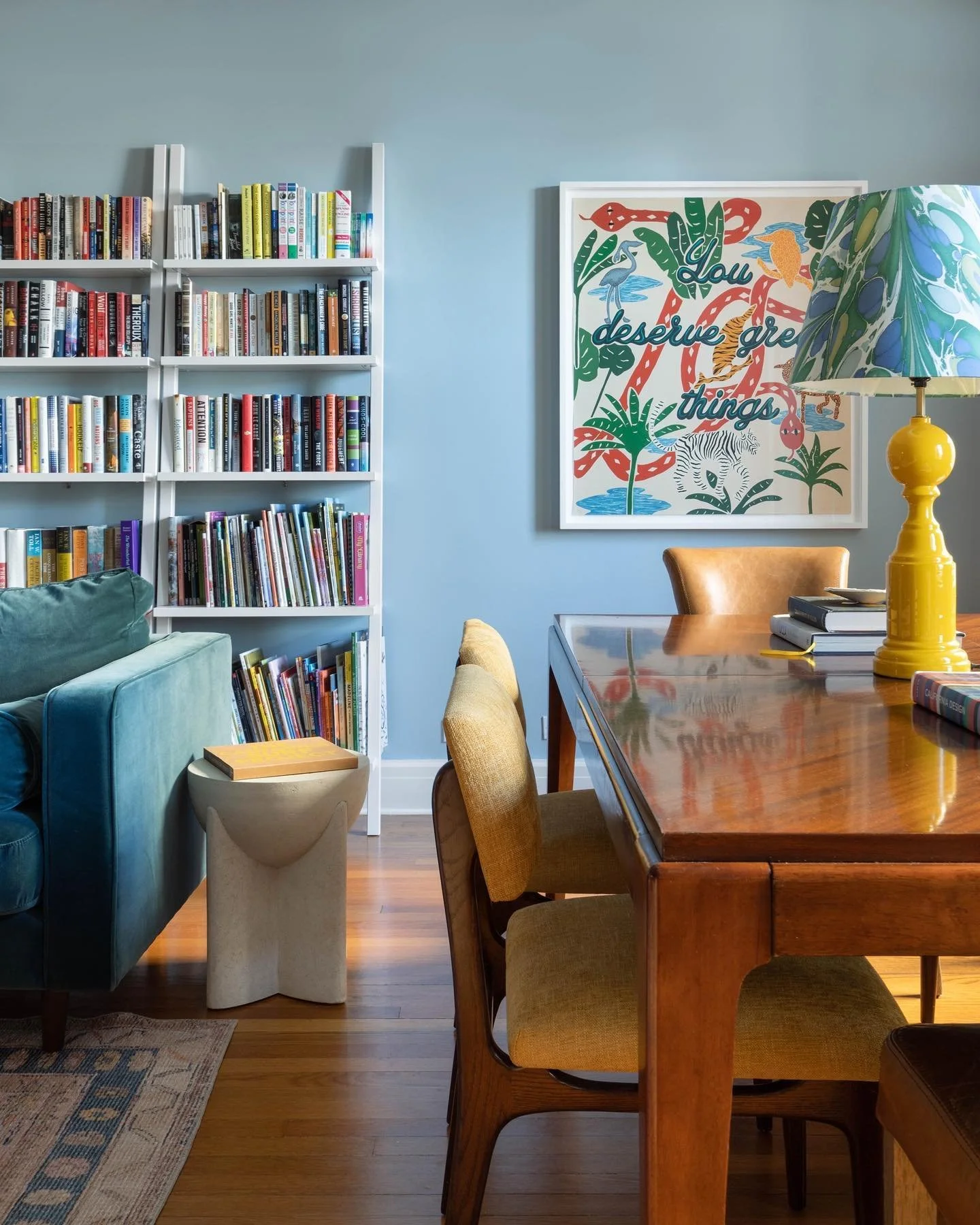 The corner of a living room we completed on the Upper East Side last year. We kept the client's dining table and repurposed it as a large library/game table. With small children it was nice to create a space that would allow groups to play games, do 