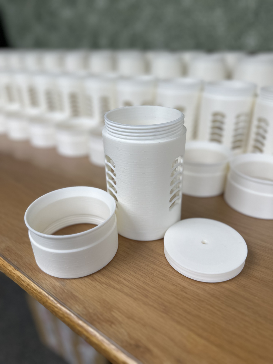 3D-printed tube and lid at Accurate CNC Services, an Idaho-based machine shop