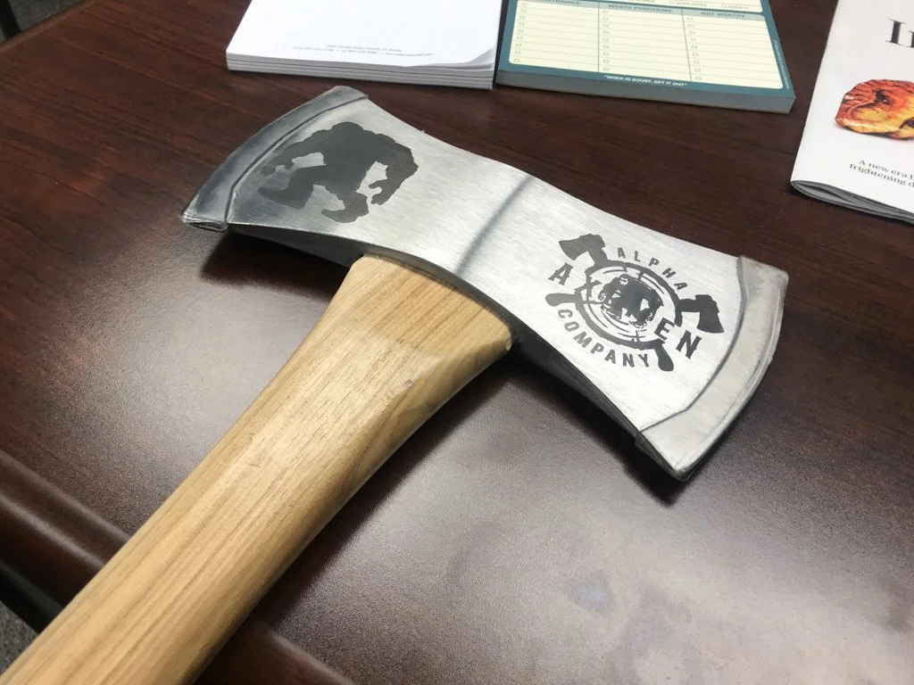 Steel-anodized axe with laser part markings on it