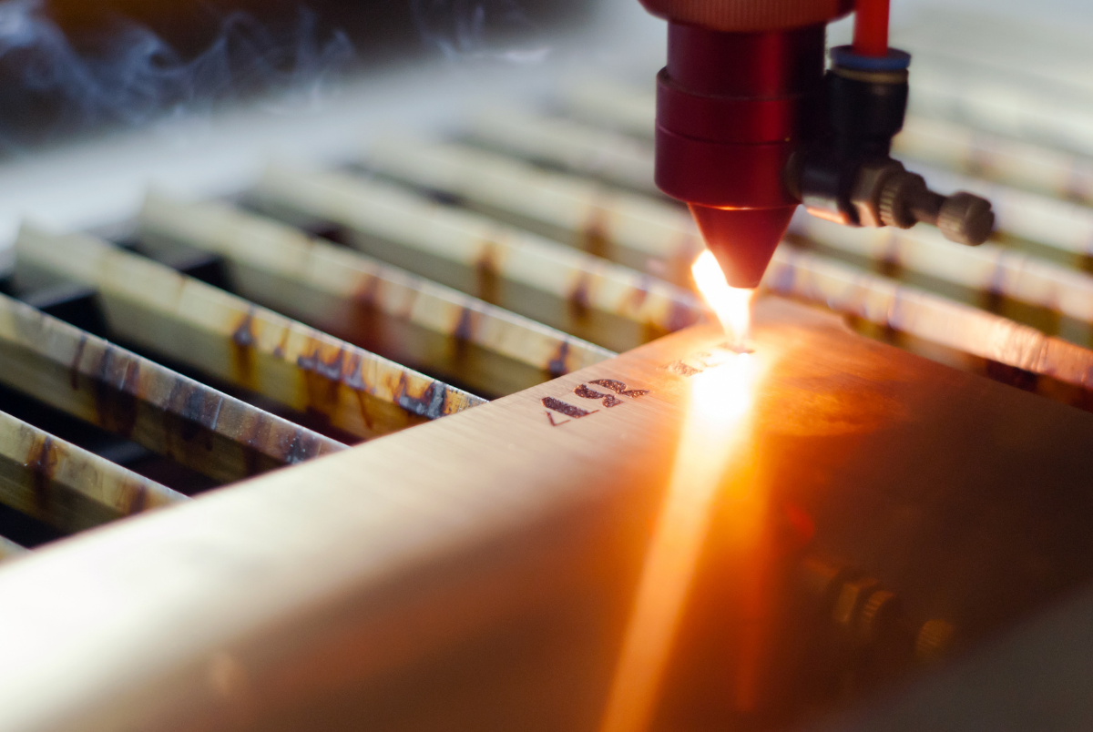 Laser marking machine putting traceability marks on sheet metal part