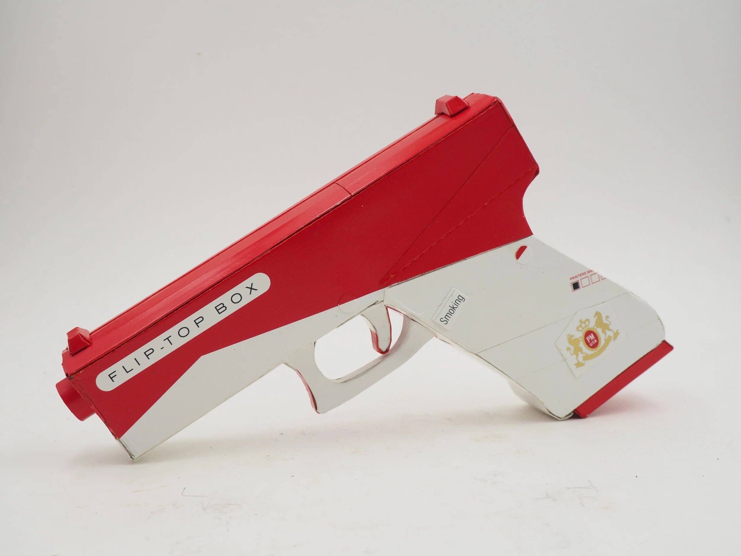 Marlboro gun violence pop art sculpture political lampoon