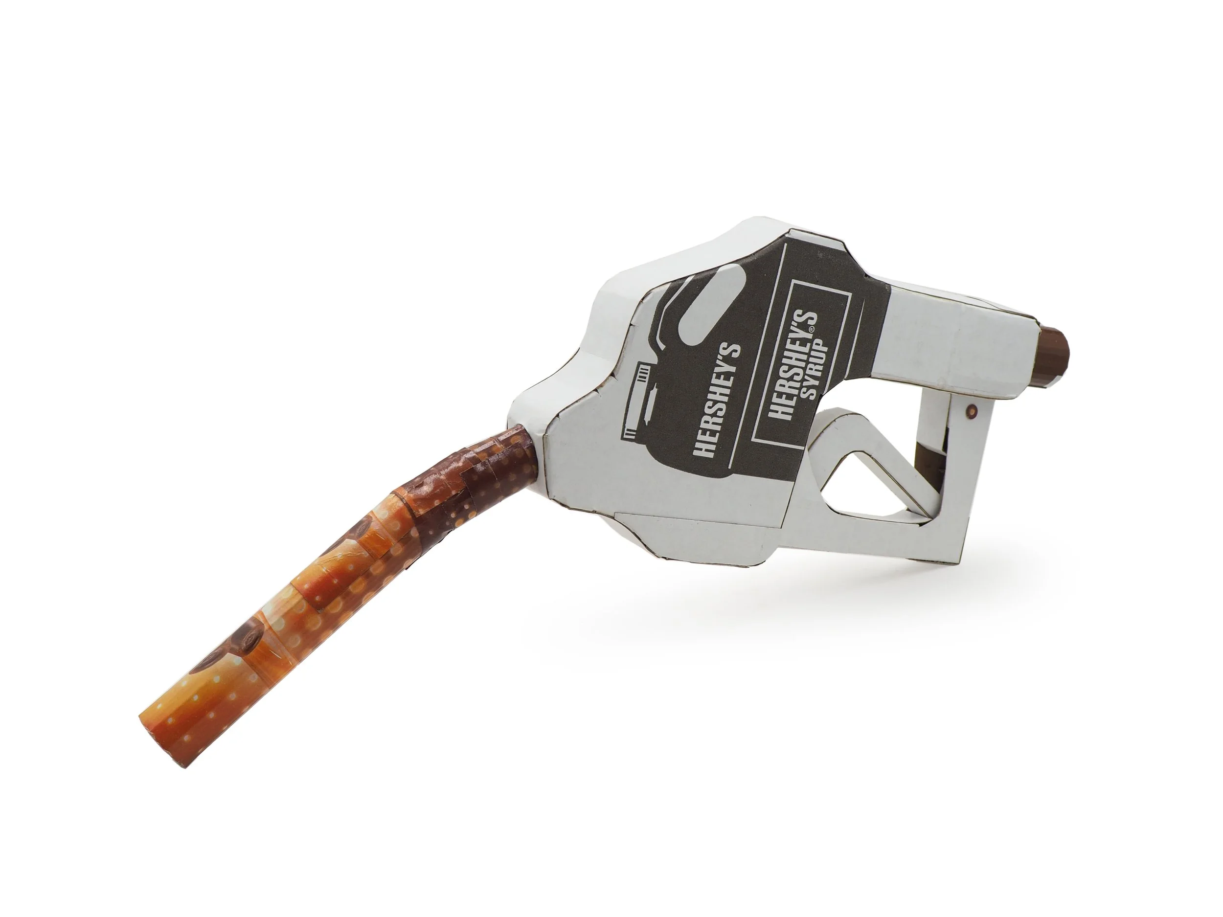 Big oil political satire kinetic art sculpture Hersheys chocolate syrup