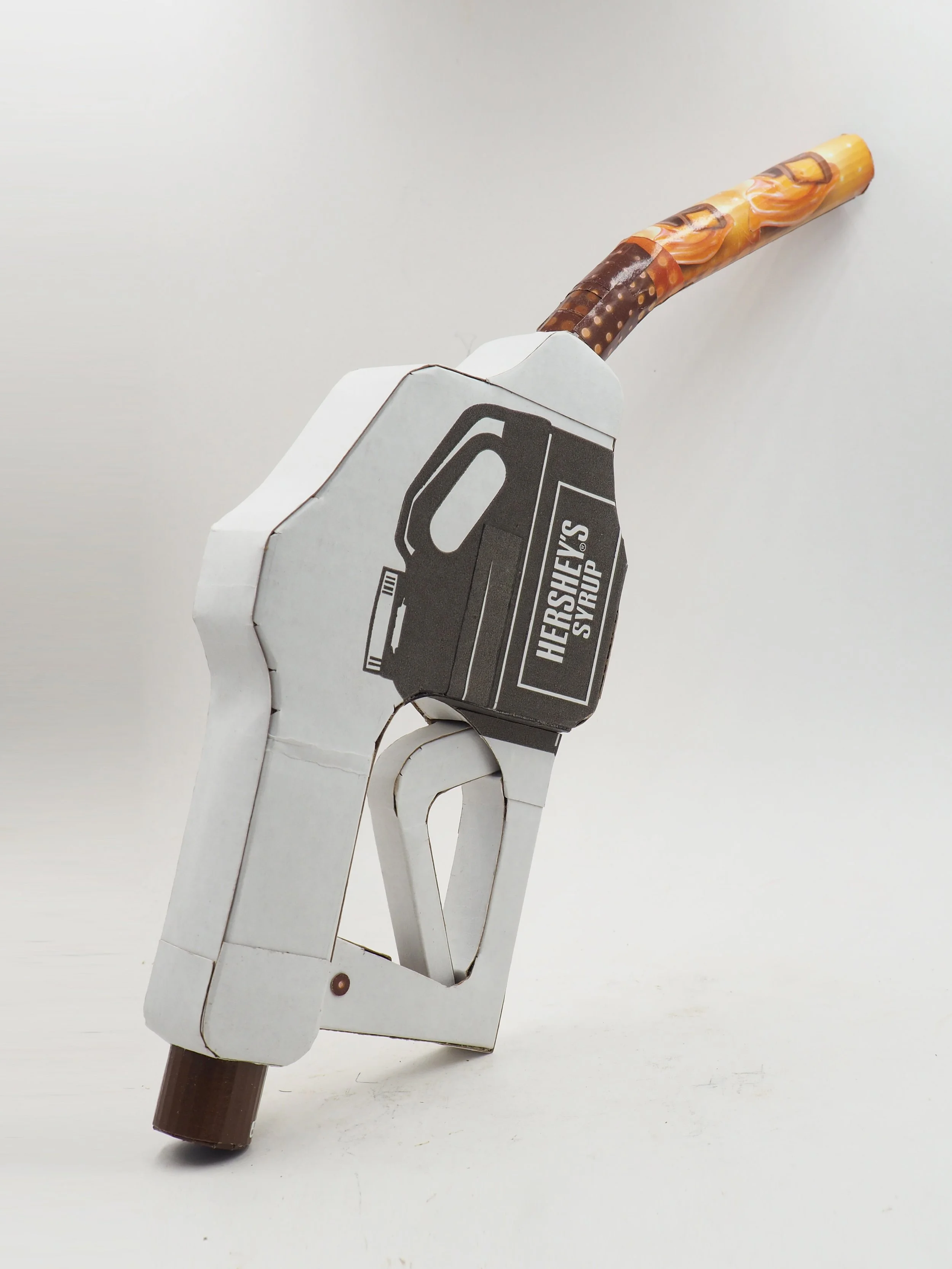 Big oil political satire kinetic art sculpture Hersheys chocolate syrup