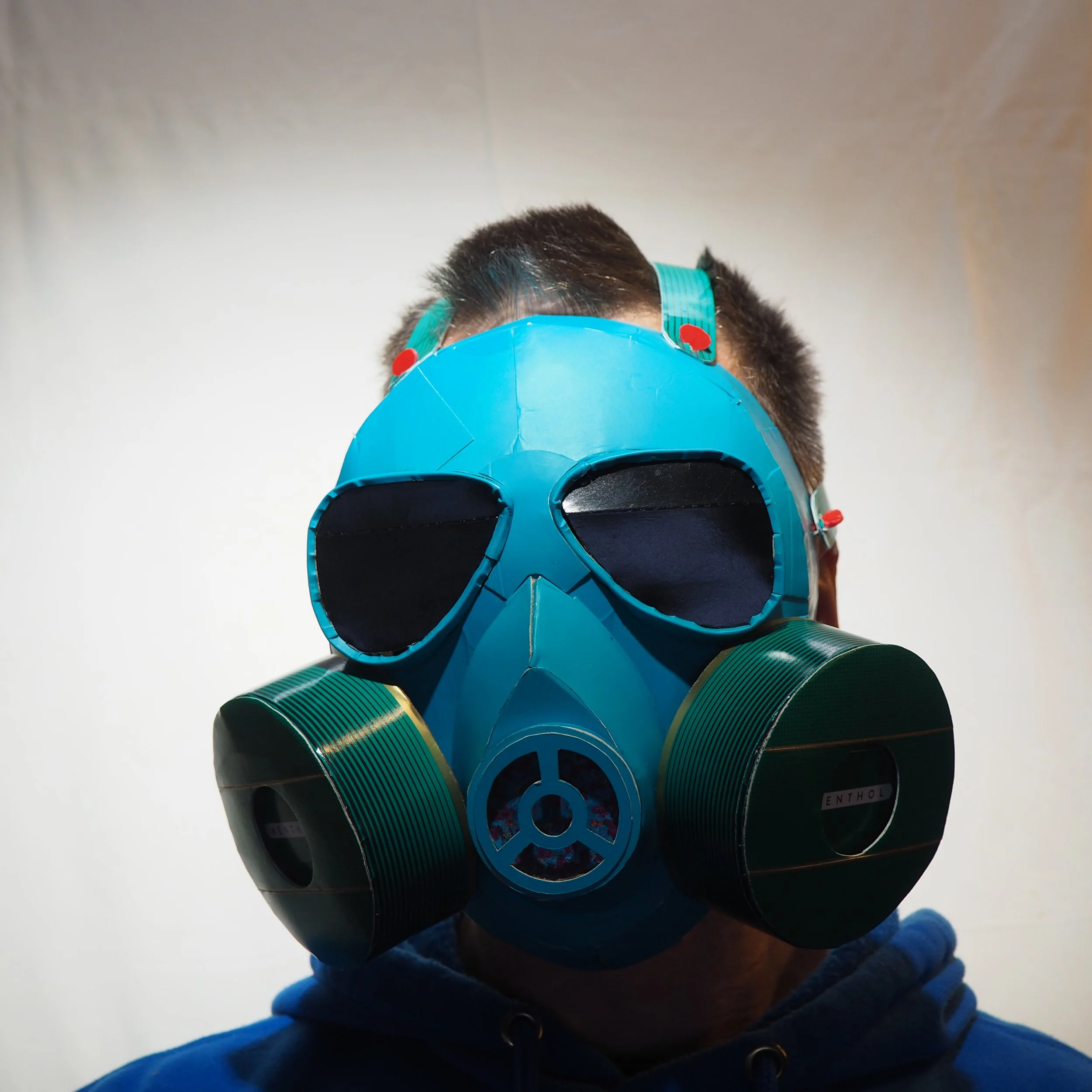 Gas mask 2020 dumpster fire wildfires George Floyd art sculpture menthol big tobacco cigarettes parody