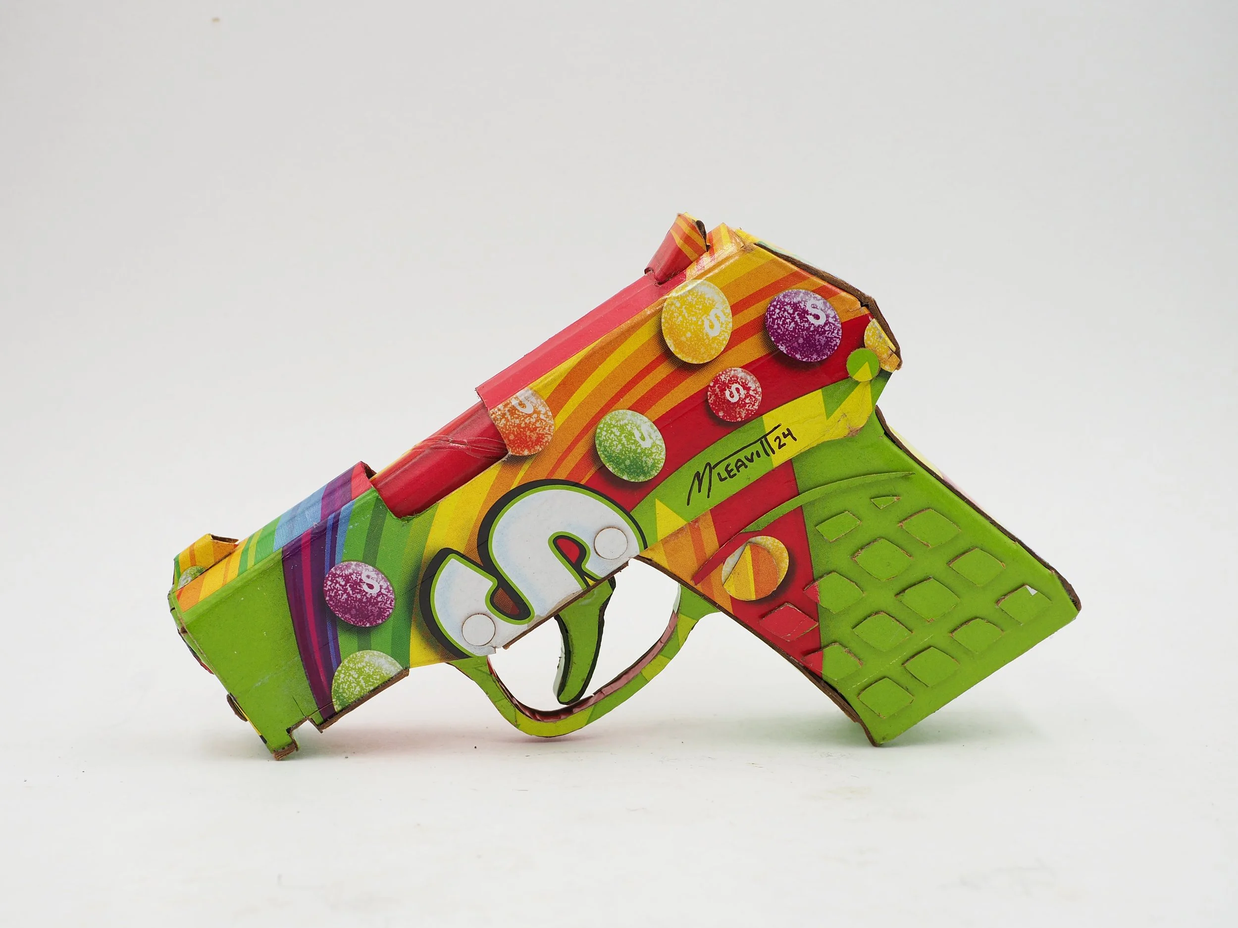 Trayvon Martin shooting gun lobby politics Skittles candy satirical post consumer culture art sculpture