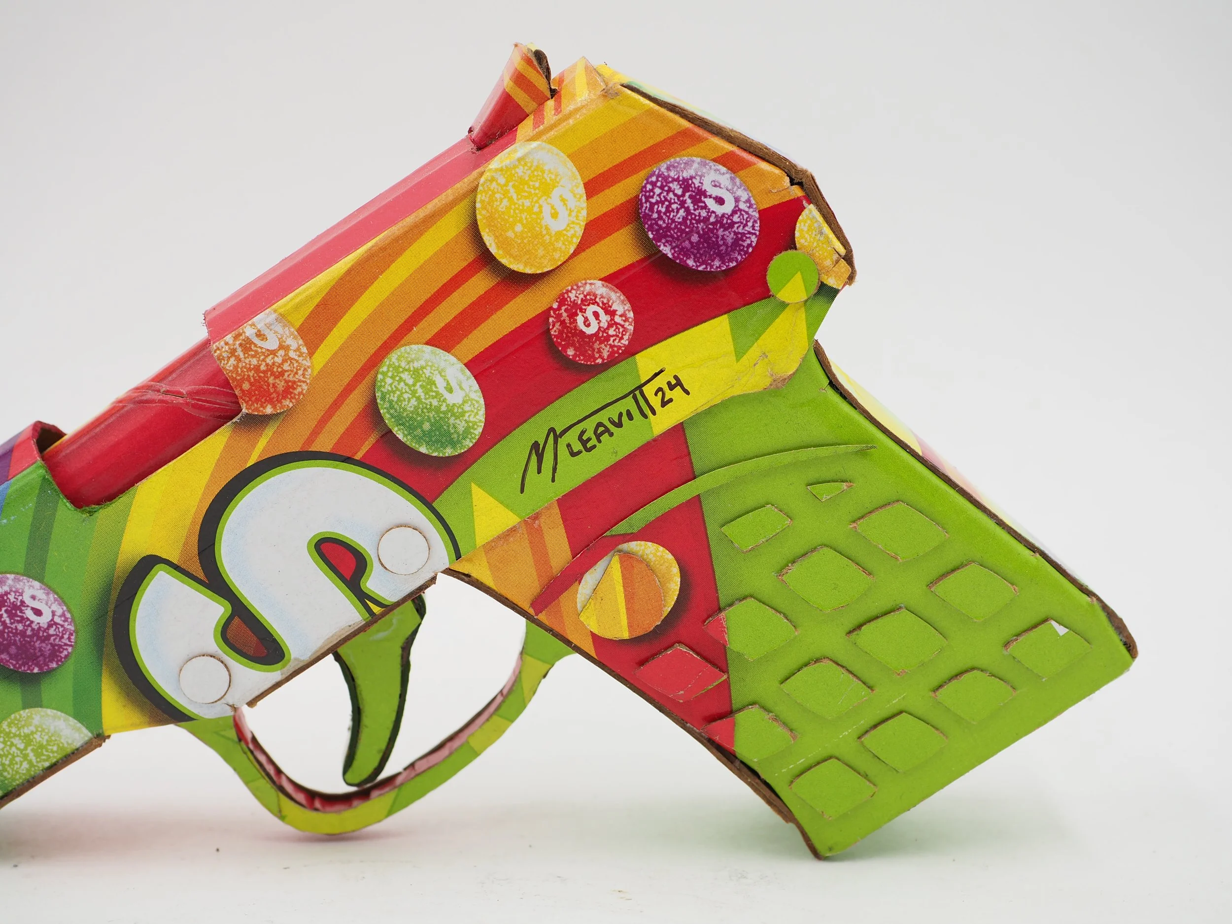 Trayvon Martin shooting gun lobby politics Skittles candy satirical art sculpture