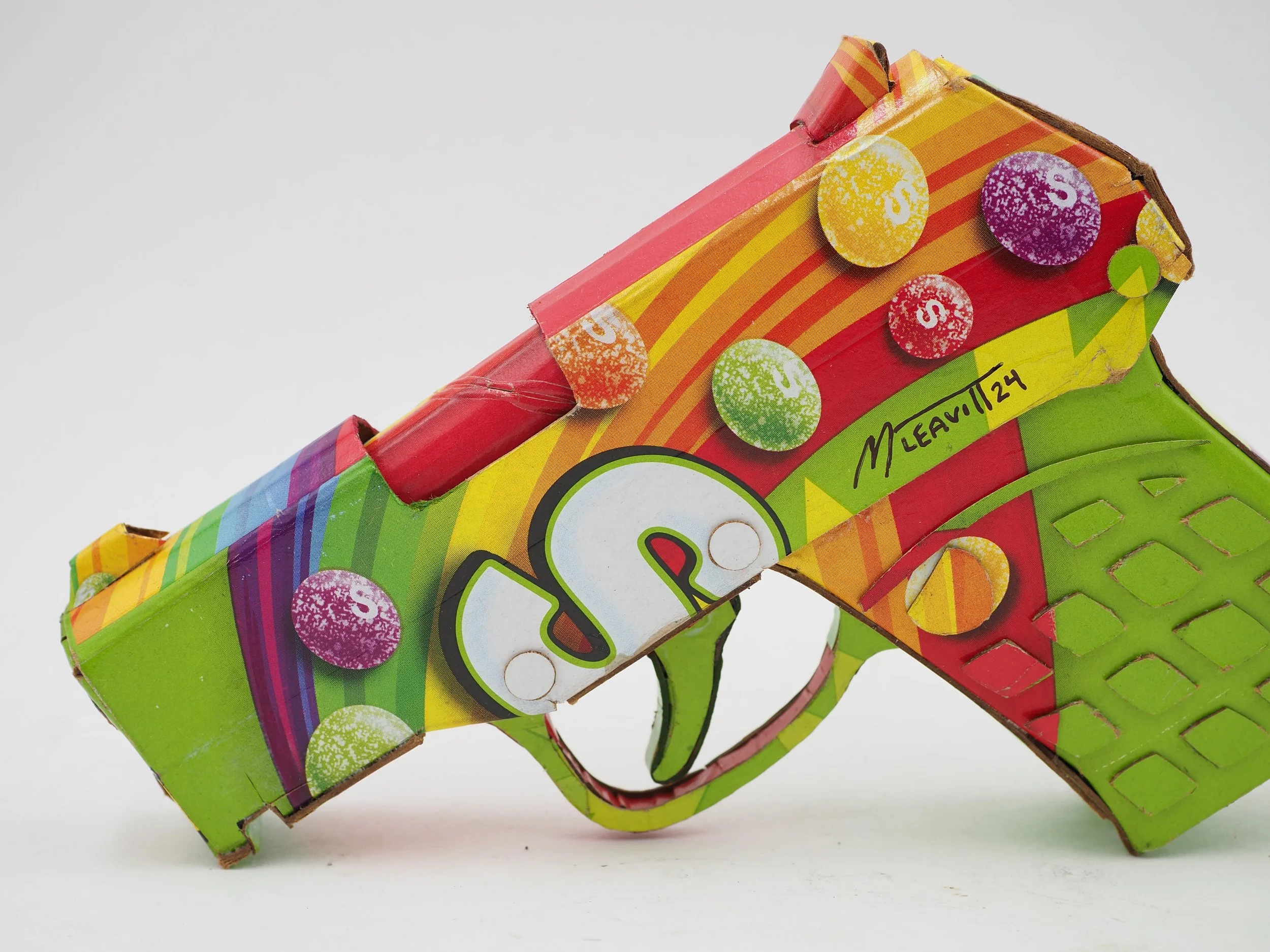 Trayvon Martin shooting gun lobby politics Skittles candy satirical art sculpture
