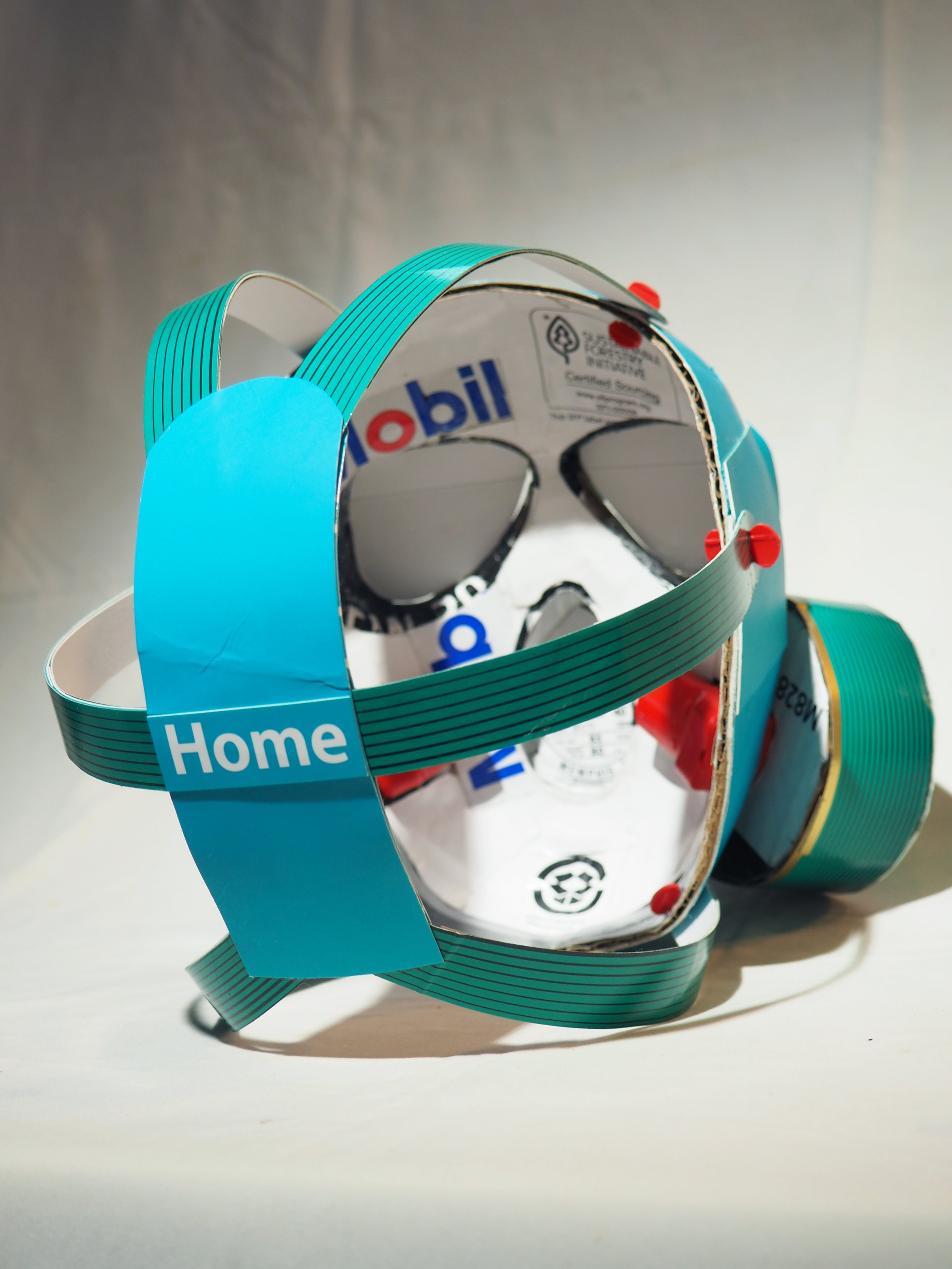 Gas mask fossil fuel industry 2020 George Floyd art sculpture recycled material parody art