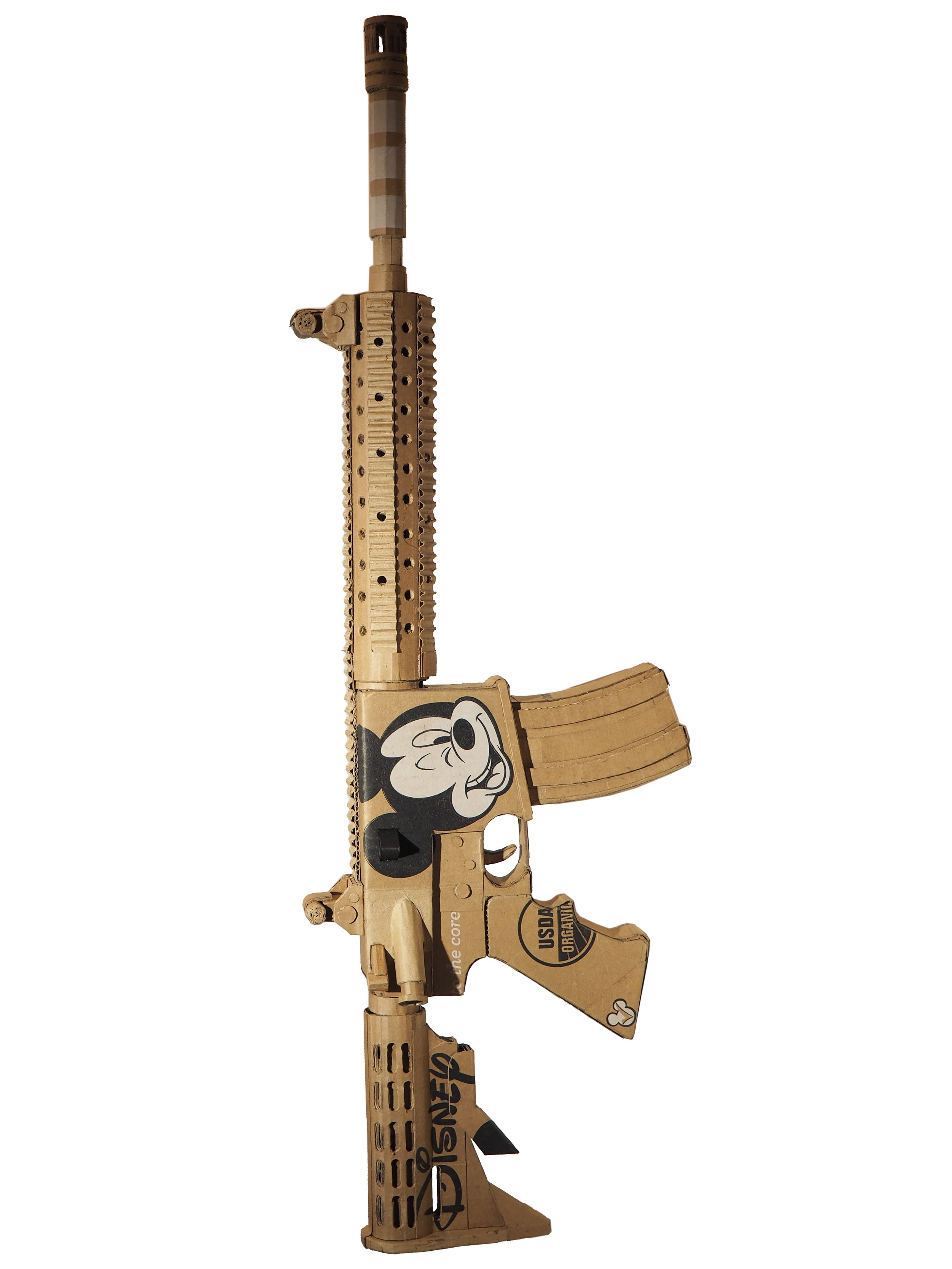 Disney Mickey Mouse satire Florida mass shooting cardboard recycled material art sculpture political action post consumer culture pop art parody