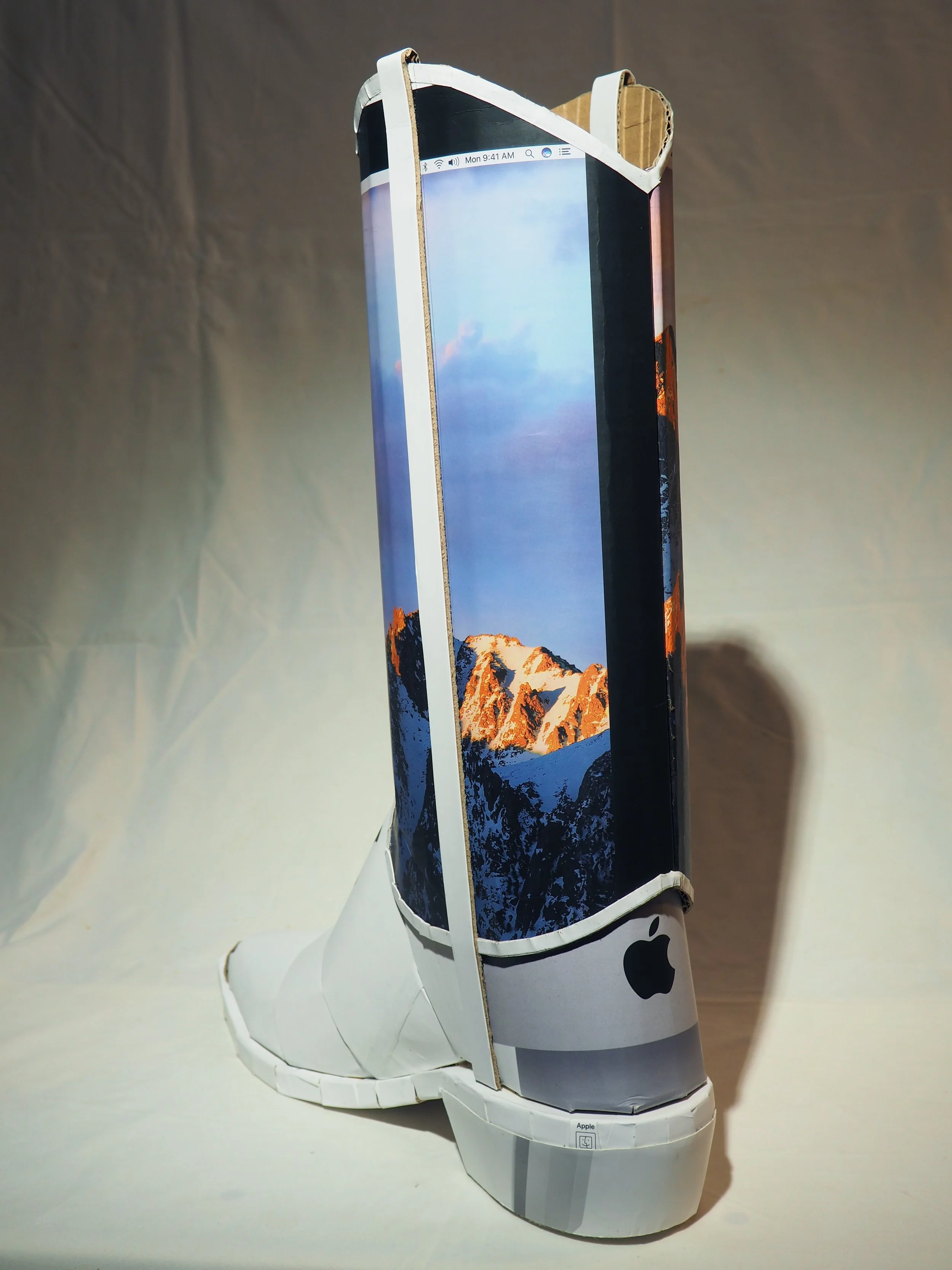 Apple iPhone iMac Macintosh corporate pop culture bashing anti-capitalist woke libs political cowboy boot recycled material fine art sculpture