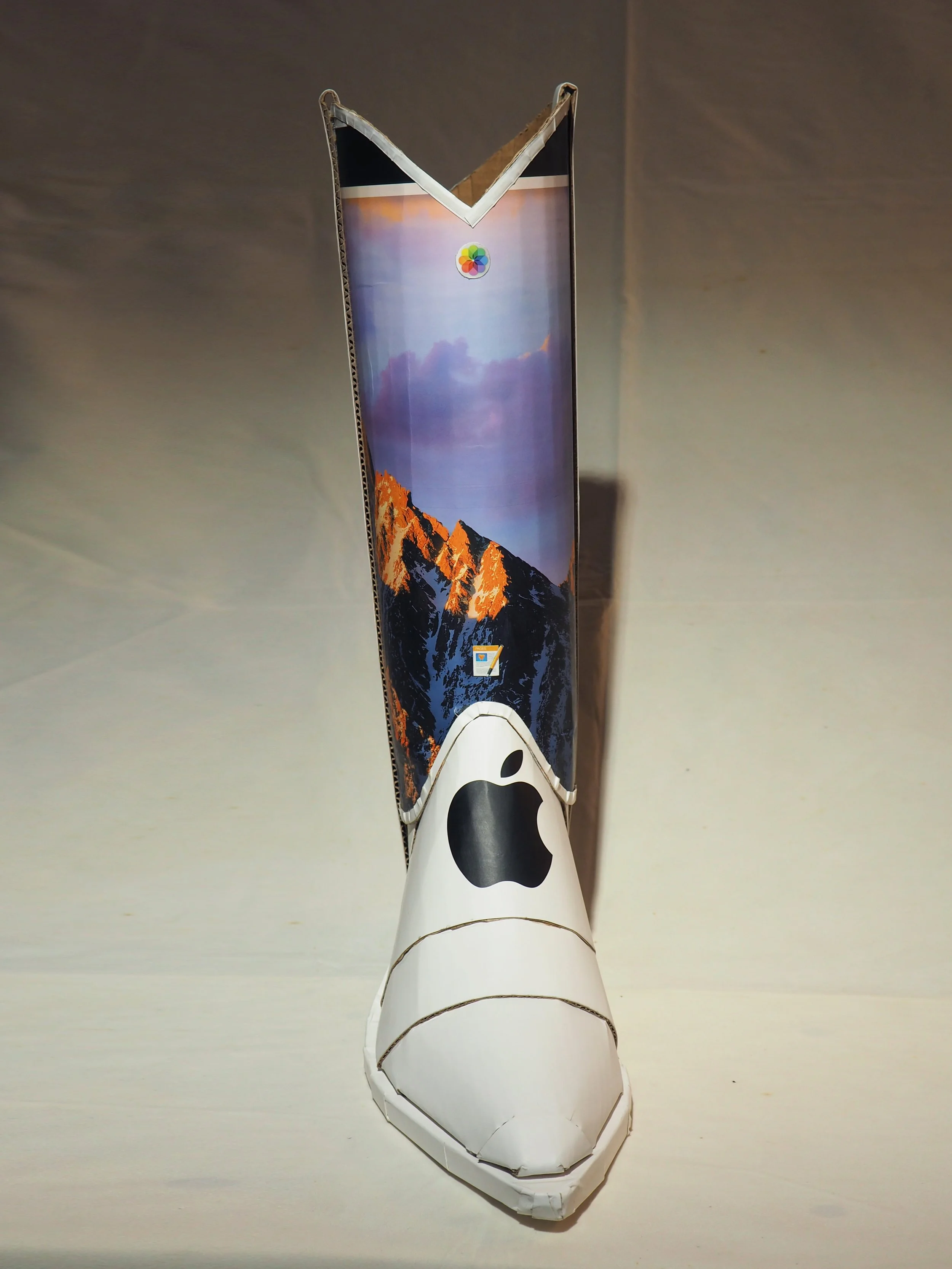 Apple iPhone iMac Macintosh corporate pop culture bashing anti-capitalist woke libs political cowboy boot recycled material fine art sculpture