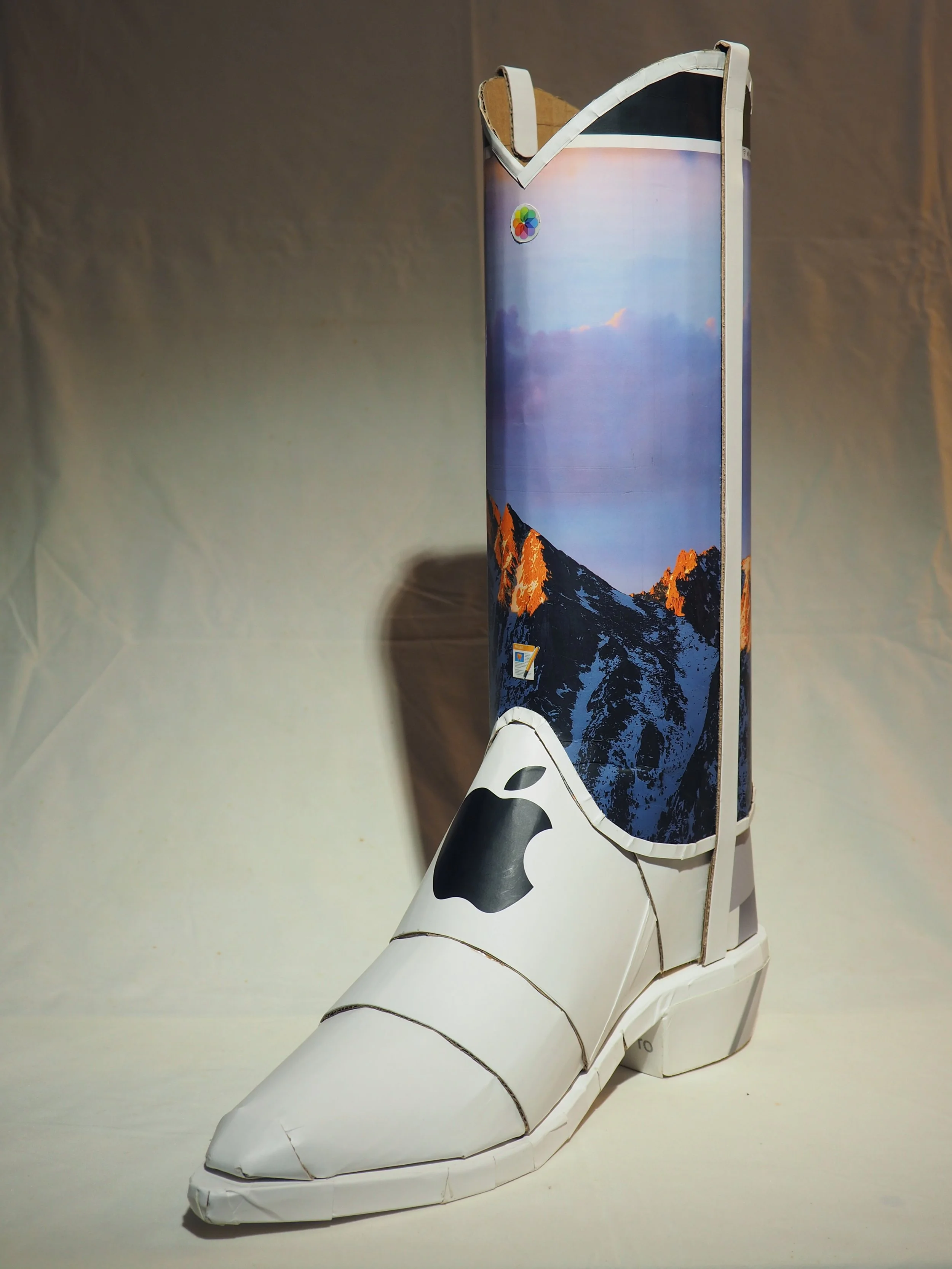 Apple iPhone iMac Macintosh corporate pop culture bashing anti-capitalist woke libs political cowboy boot recycled material fine art sculpture