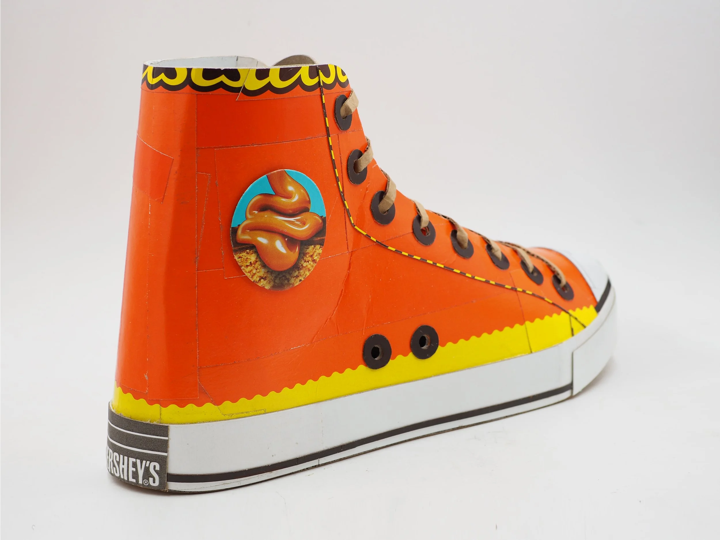 Reeses Hershey chocolate candy Chuck Taylor Converse All-Star orange candy collector basketball shoe geek pop art parody sculpture