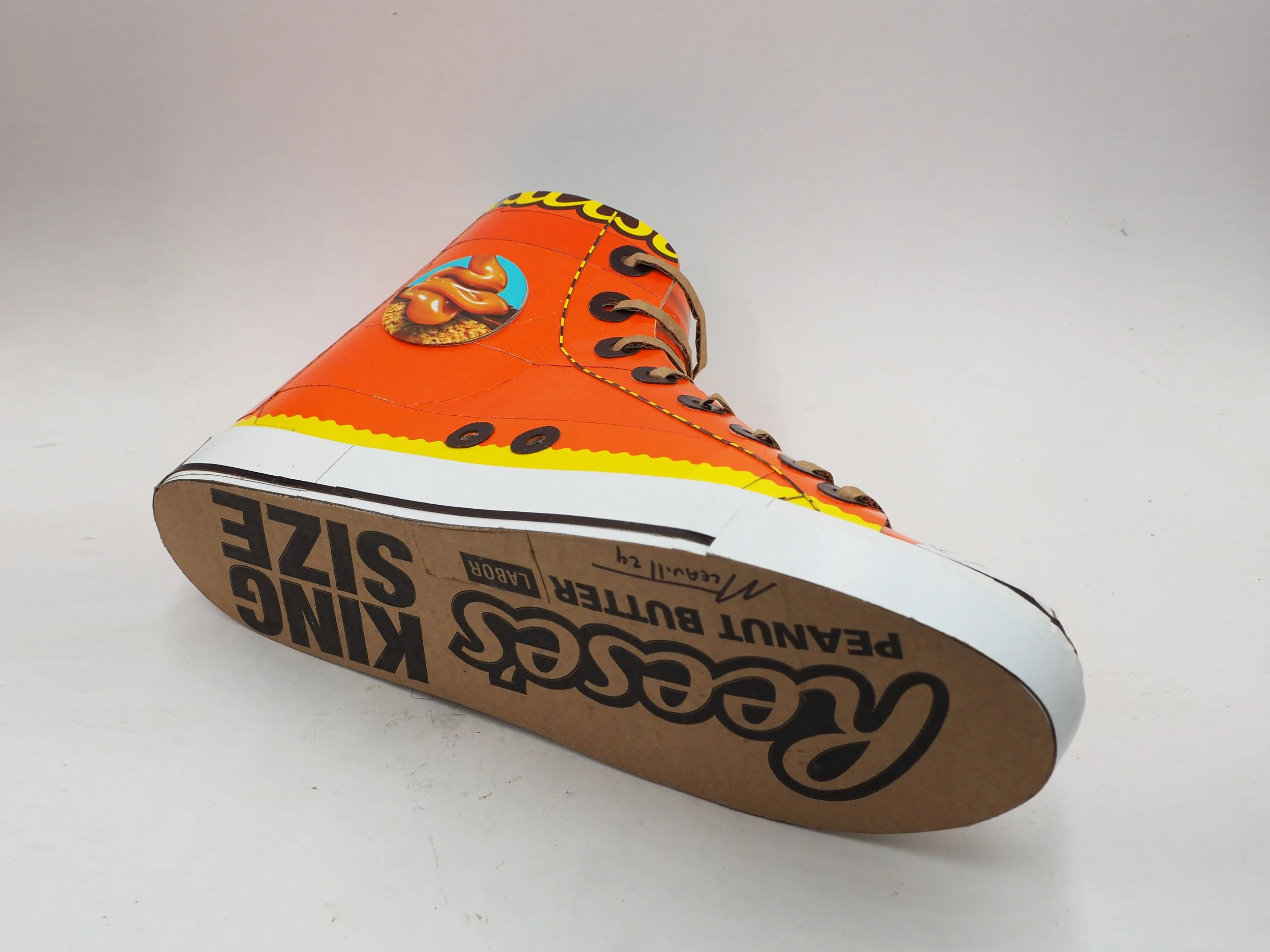 Reeses Hershey chocolate Chuck Taylor Converse All-Star orange candy collector basketball shoe geek pop art parody sculpture