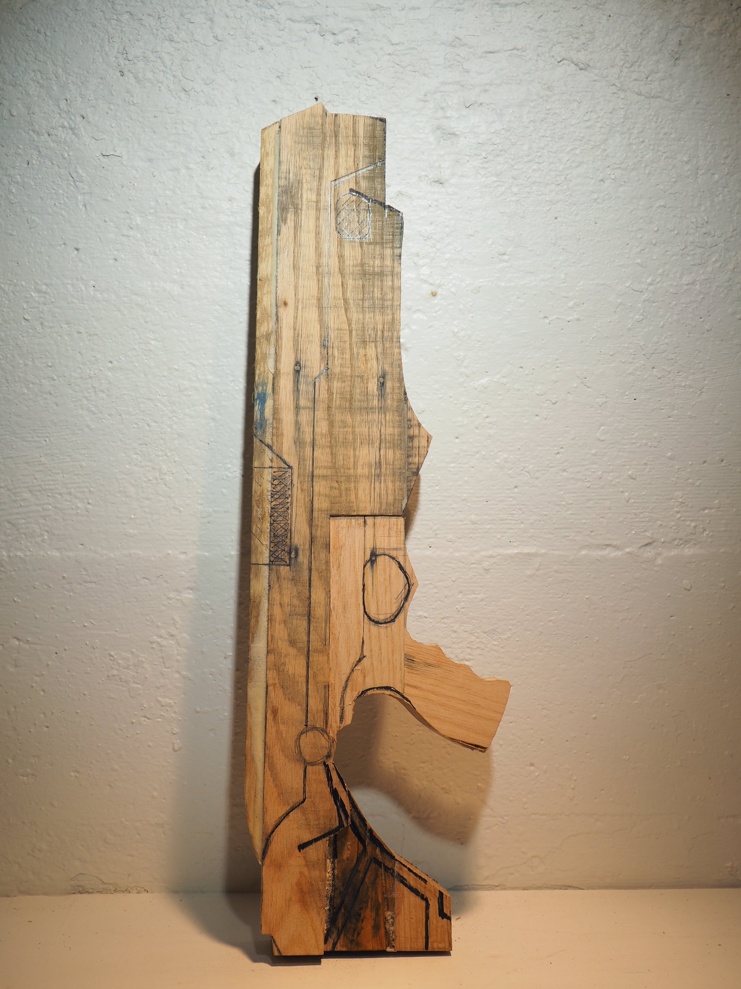 Elon Musk flame thrower Twitter X Tesla corporate culture anti-capitalist woodworking wood sculpture recycled reclaimed pallet wood satire celebrity parody art