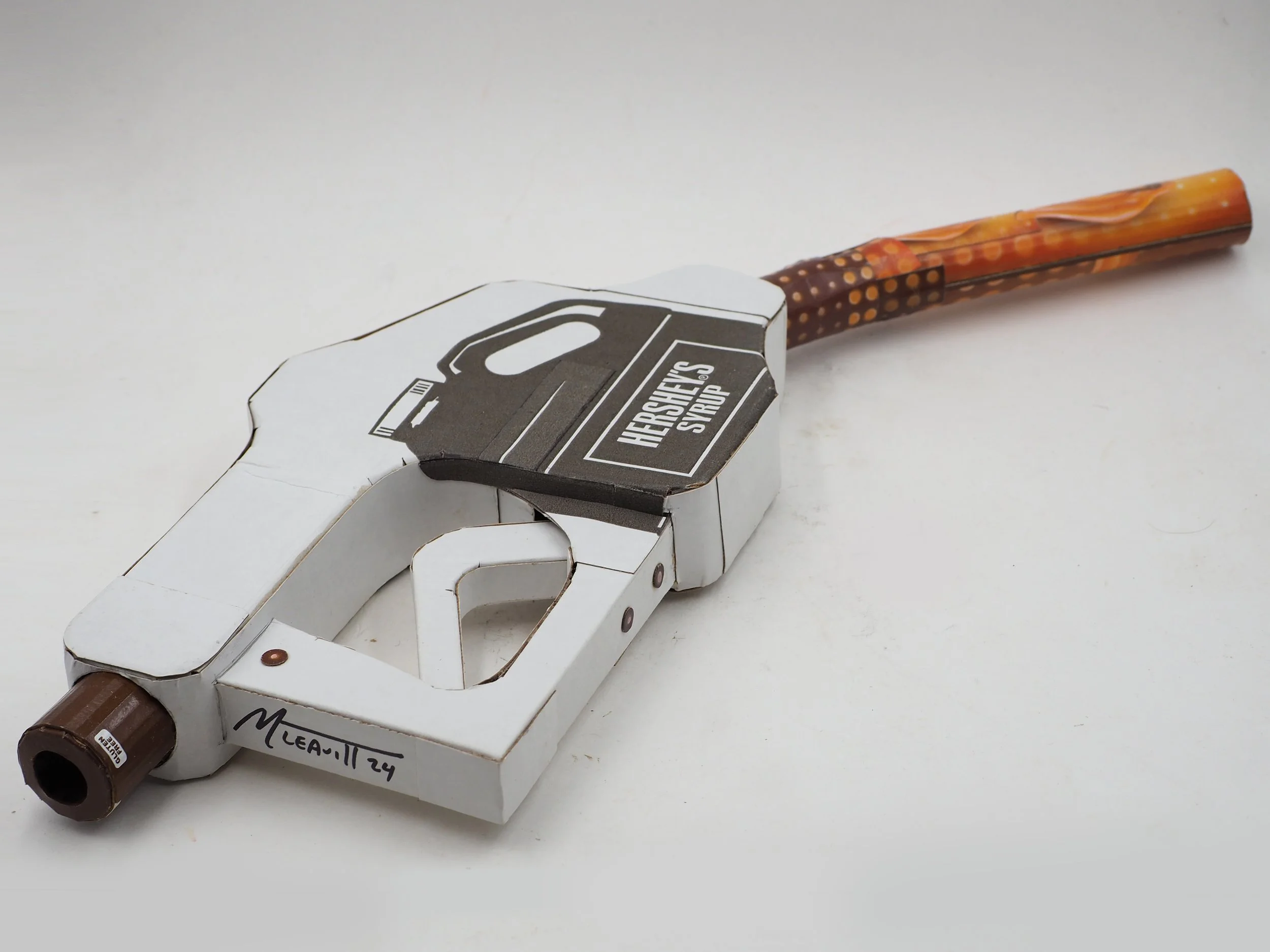 Big oil political satire kinetic art sculpture Hersheys chocolate syrup