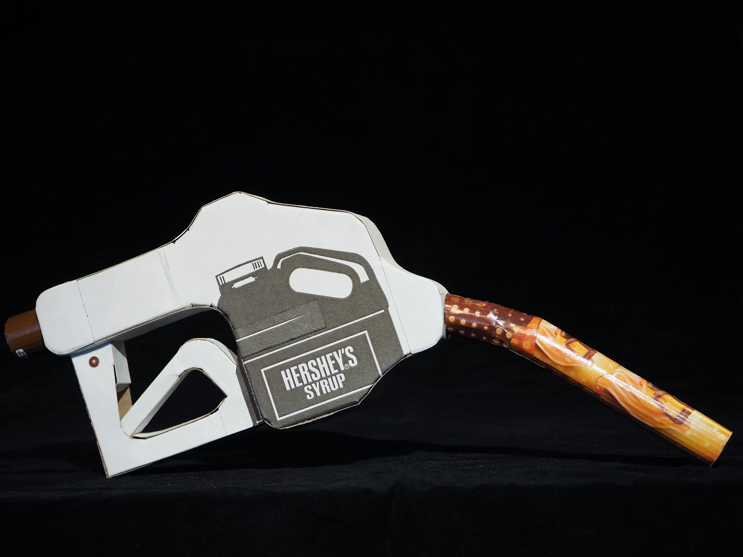 Big oil political satire kinetic art sculpture Hersheys chocolate syrup