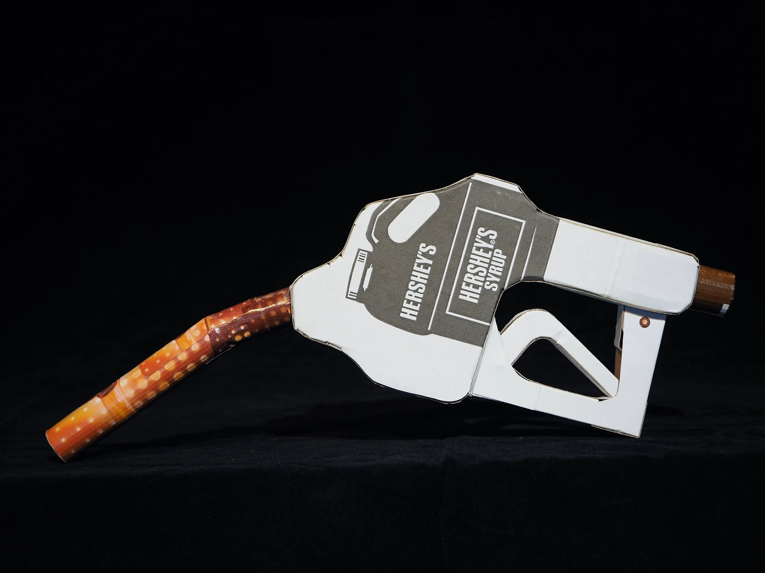 Big oil political satire kinetic art sculpture Hersheys chocolate syrup