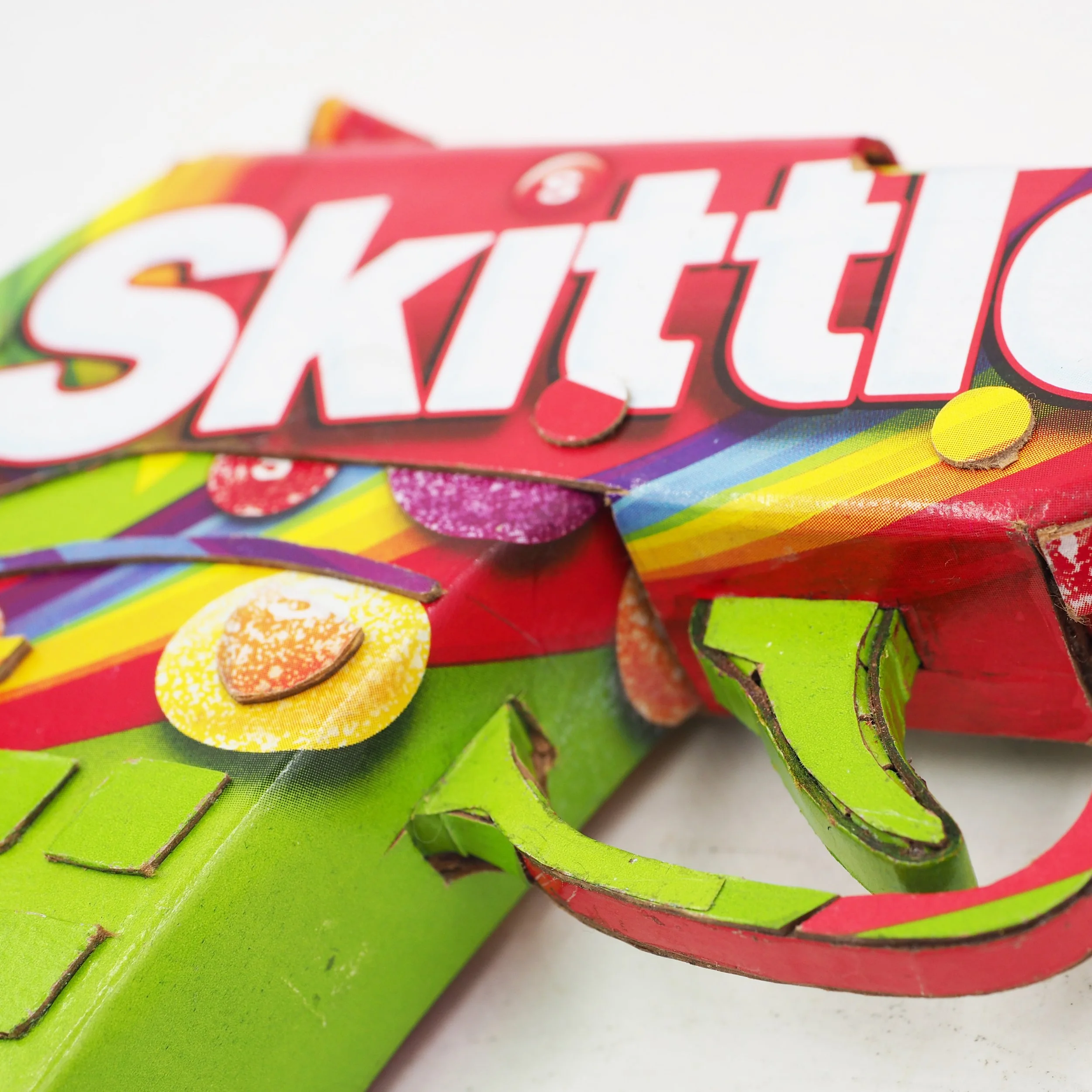 Trayvon Martin shooting gun lobby politics taste rainbow Skittles candy satirical post consumer culture art sculpture