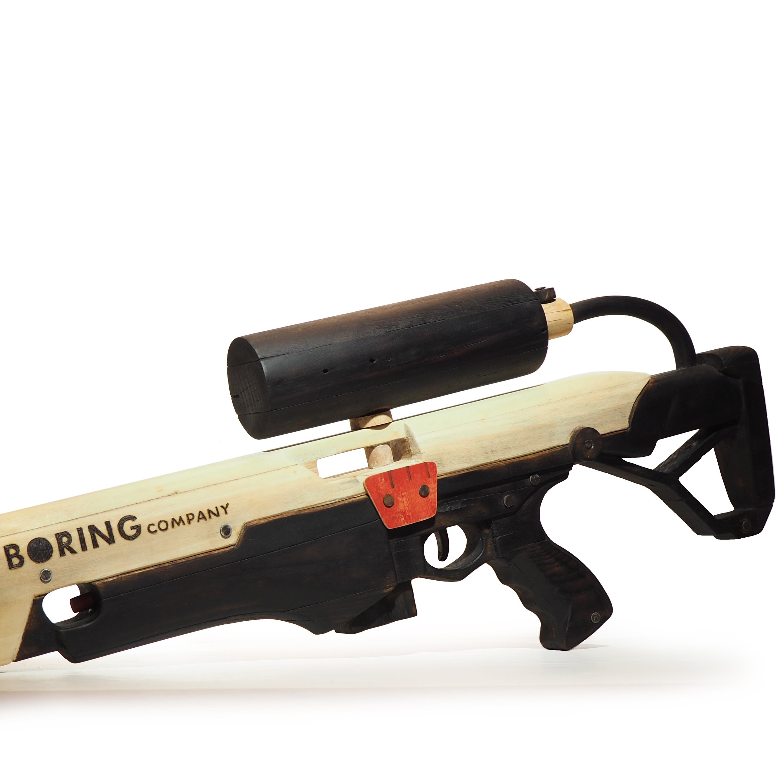 Elon Musk Boring Company flame thrower Twitter X Tesla corporate culture anti-capitalist woodworking wood sculpture recycled reclaimed pallet wood satire celebrity parody art