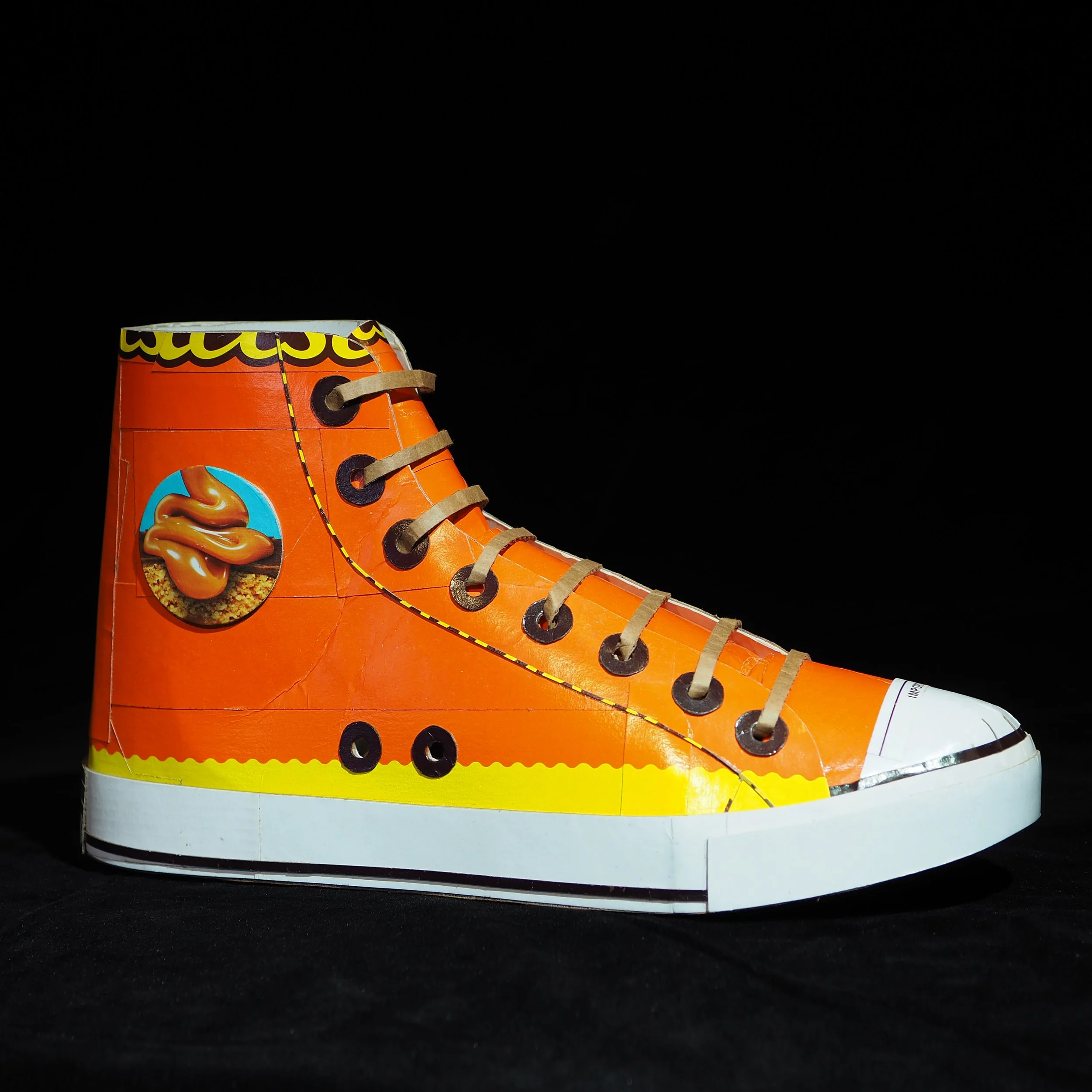 Reeses Hershey chocolate candy Chuck Taylor Converse All-Star orange candy collector NBA basketball shoe geek pop art parody sculpture
