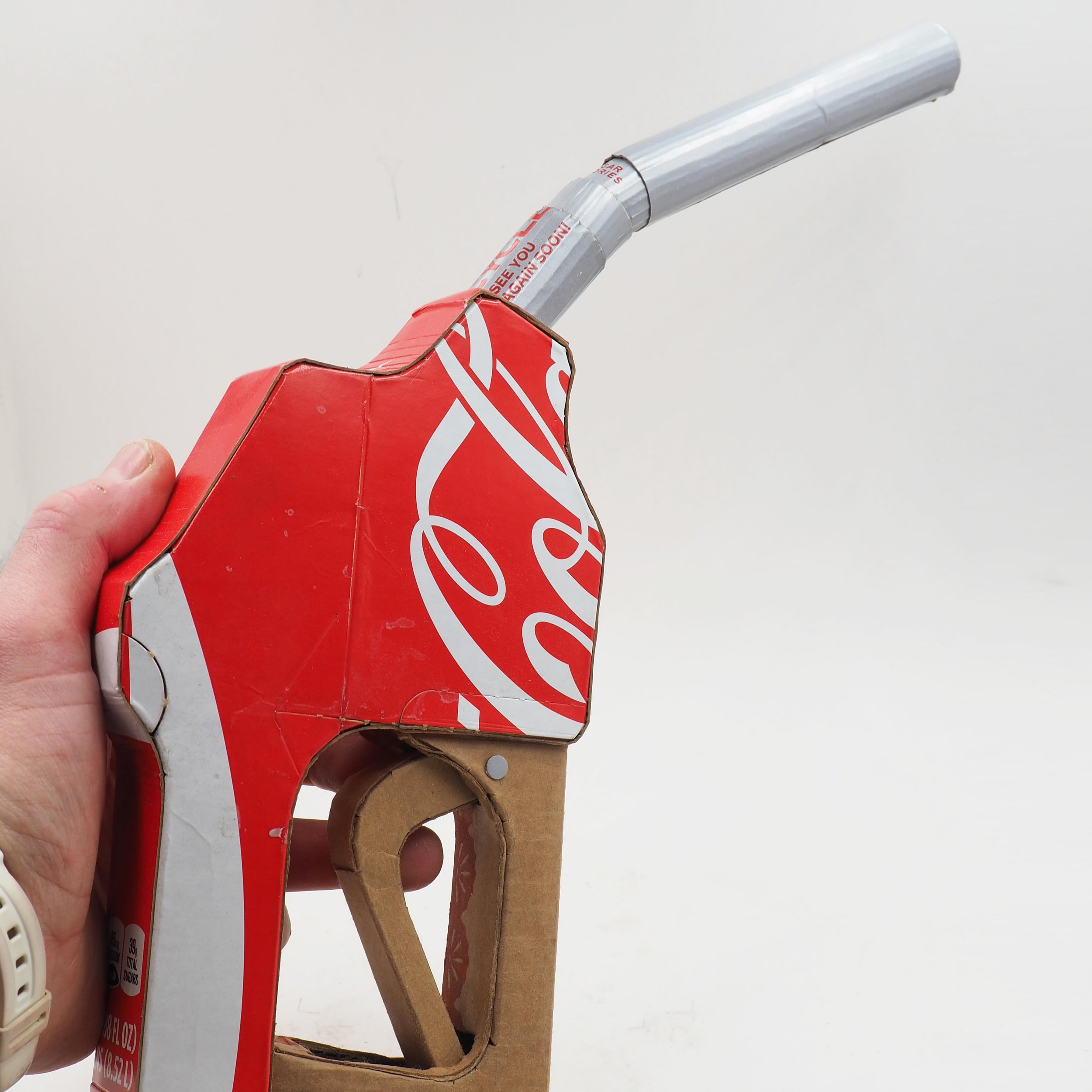 ready to fill up? There&rsquo;s more where this came from. More gas &lsquo;notzles&rsquo; (3 more, I think), a full size gas pump replica made from nothing but beer, liquor &amp; soda boxes, a massive gas can, motor oil bottles&hellip; all of it &amp