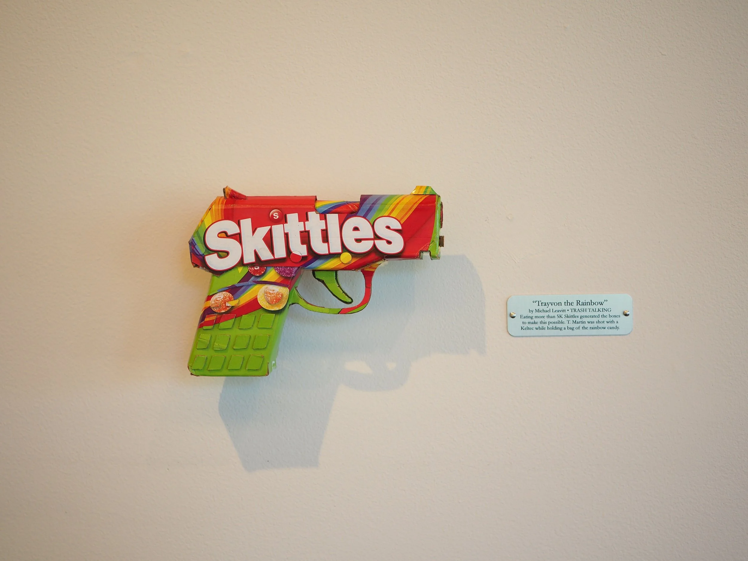 Trayvon Martin shooting gun lobby politics Skittles candy satirical art sculpture
