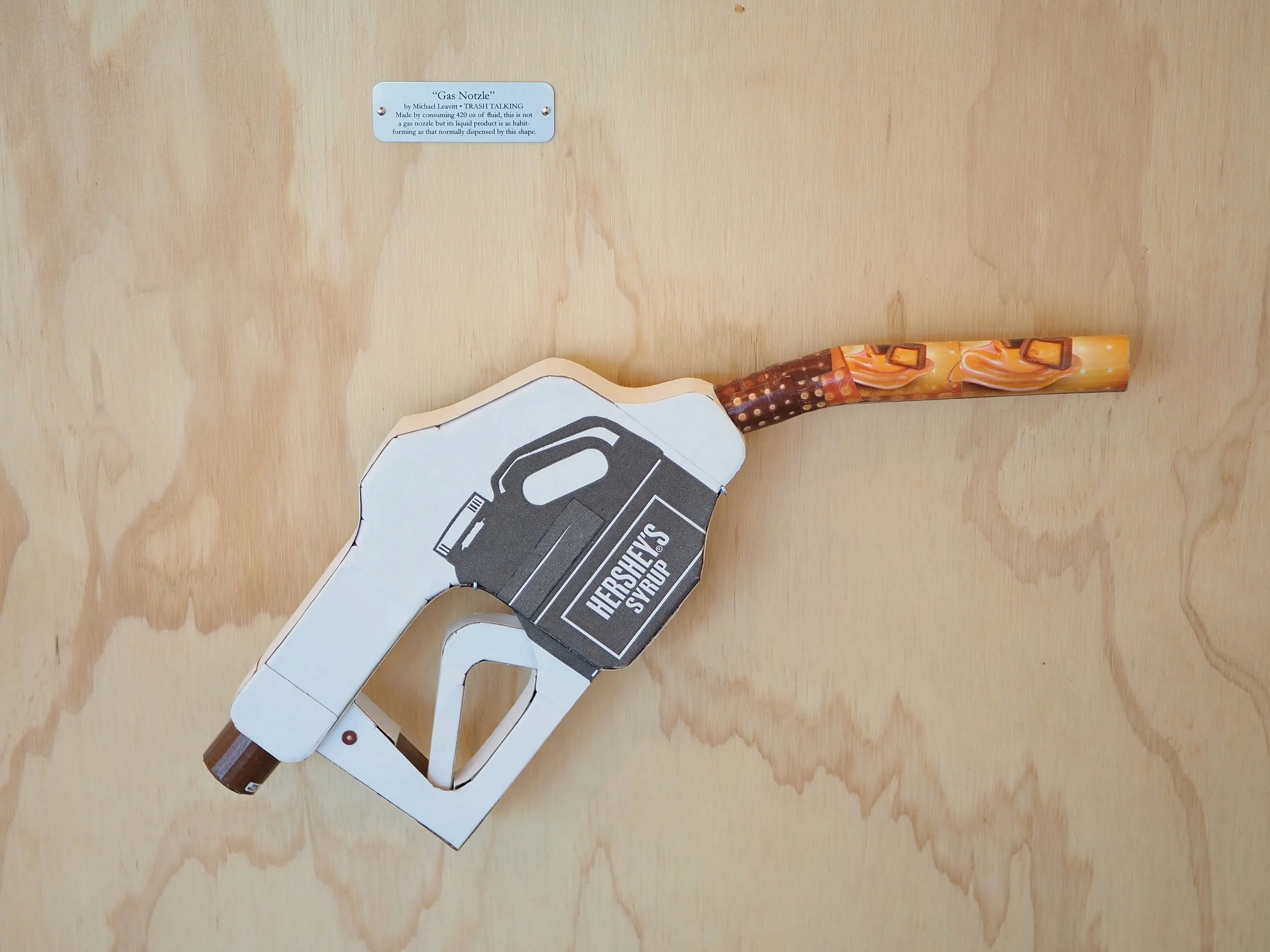 Big oil political satire kinetic art sculpture Hersheys chocolate syrup