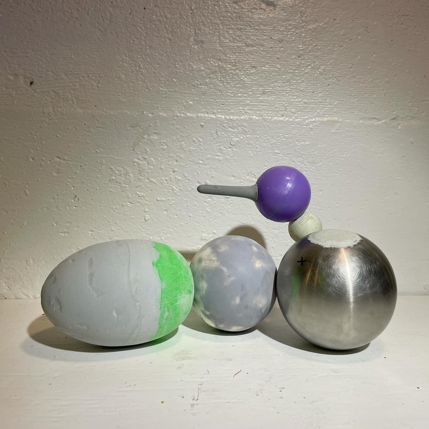 modifying to fit these together for a “balloon” effect. Screwing, gluing, adding bondo to make the egg less egg, more uniform oval. Sanding, priming, sculpting polymer clay parts to get glued on