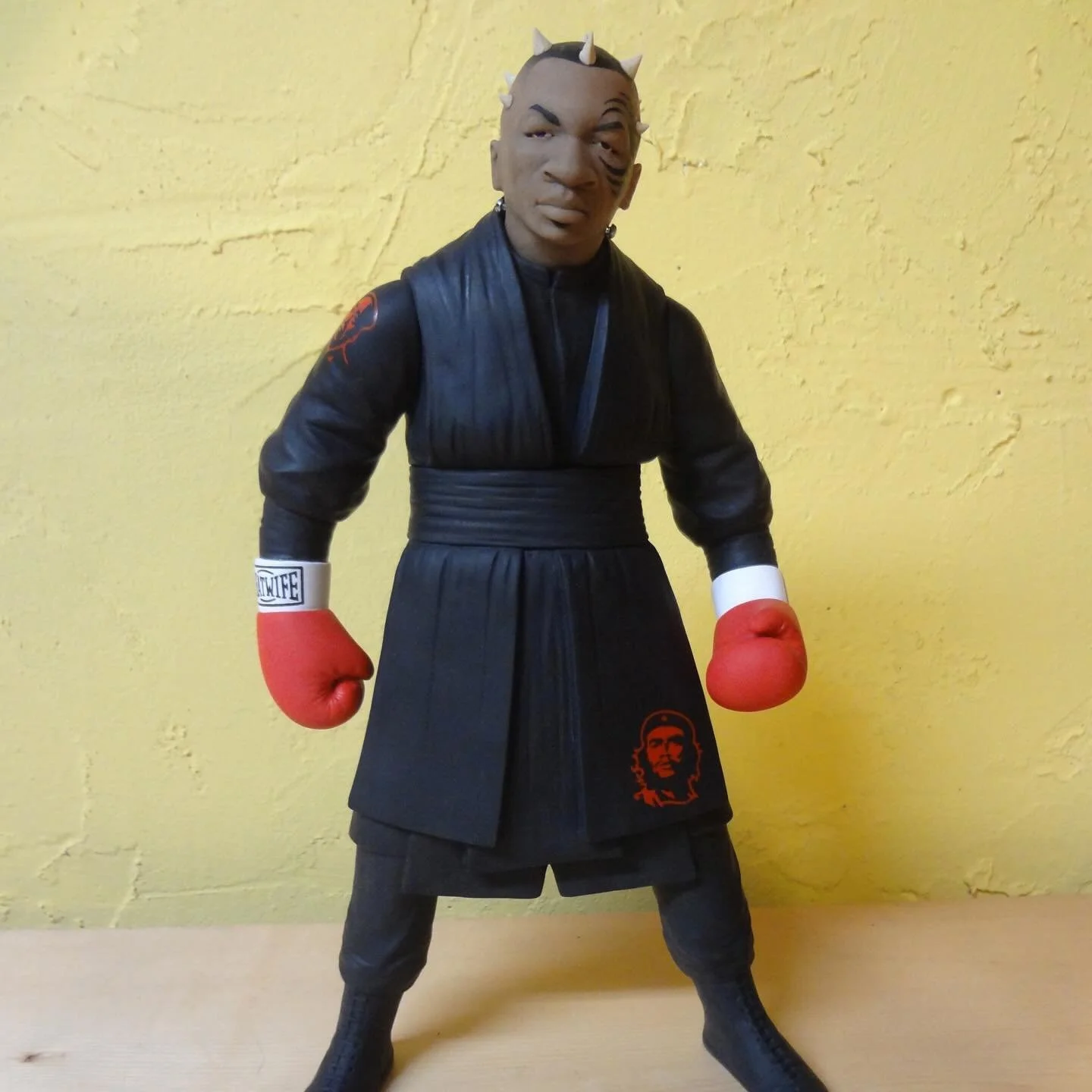 this one-off piece stands 12&rdquo; tall with 5 articulating parts, hand sculpted polymer clay with elastic and steel armatures, hand painted details depicted Mike Tyson&rsquo;s real life tattoos. Up for auction at my link