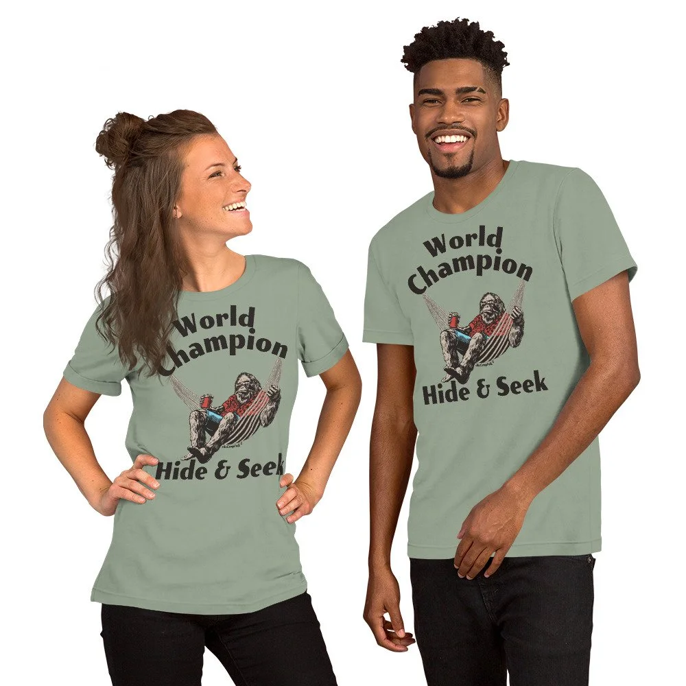 Ladies Mens Big Foot t shirt World Champion Hide & Seek Sasquatch #WeCampFolk Unisex Nature T-Shirt unisex-staple-t-shirt-sage-front-68d5749de083b.jpg